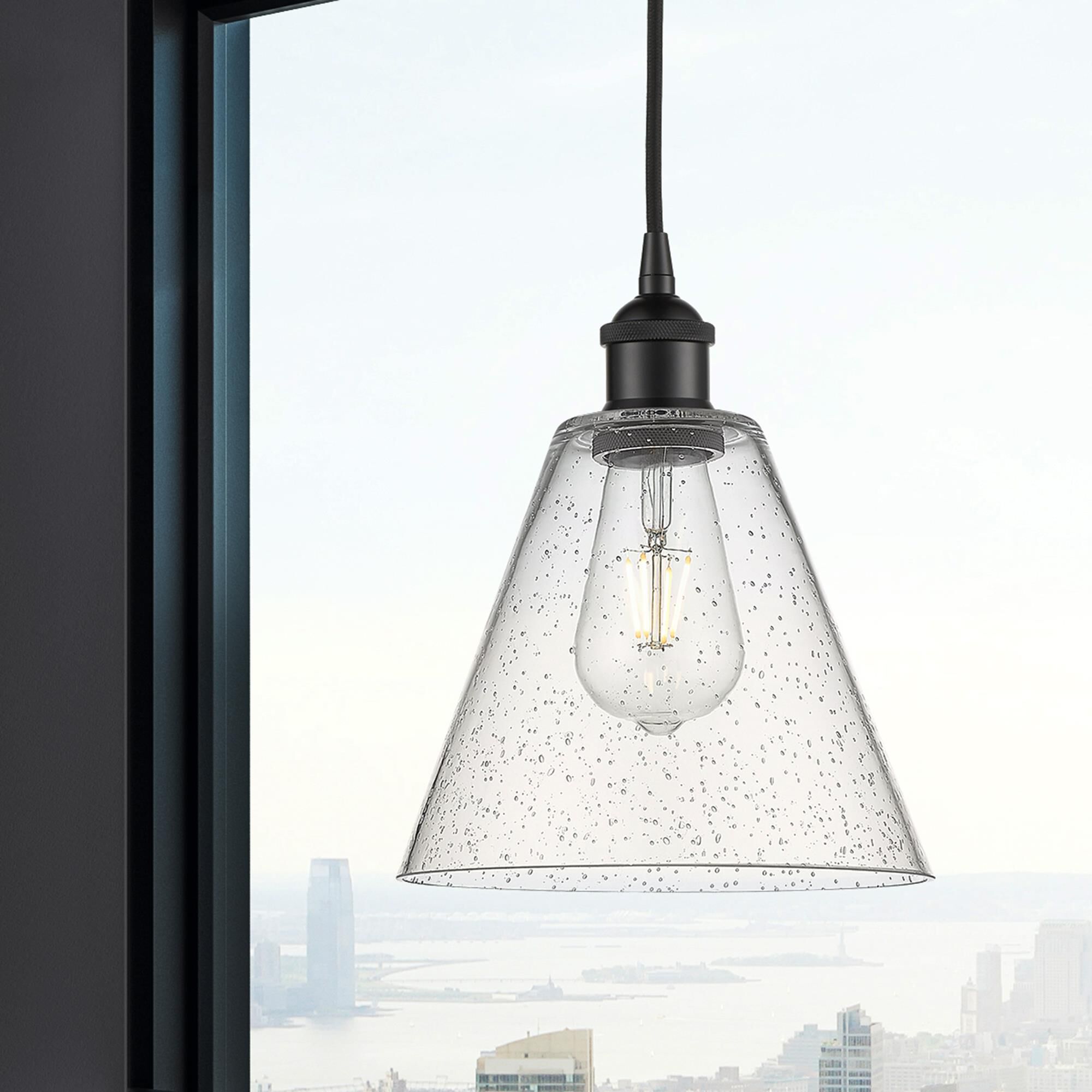 Shown in Matte Black finish and Seedy glass