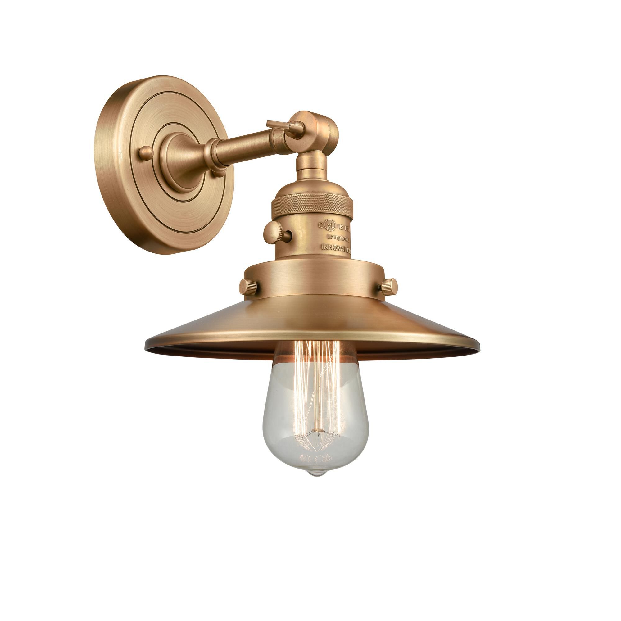 Shown in Brushed Brass finish and Brushed Brass glass and Brushed Brass shade and Switch on Socket accent