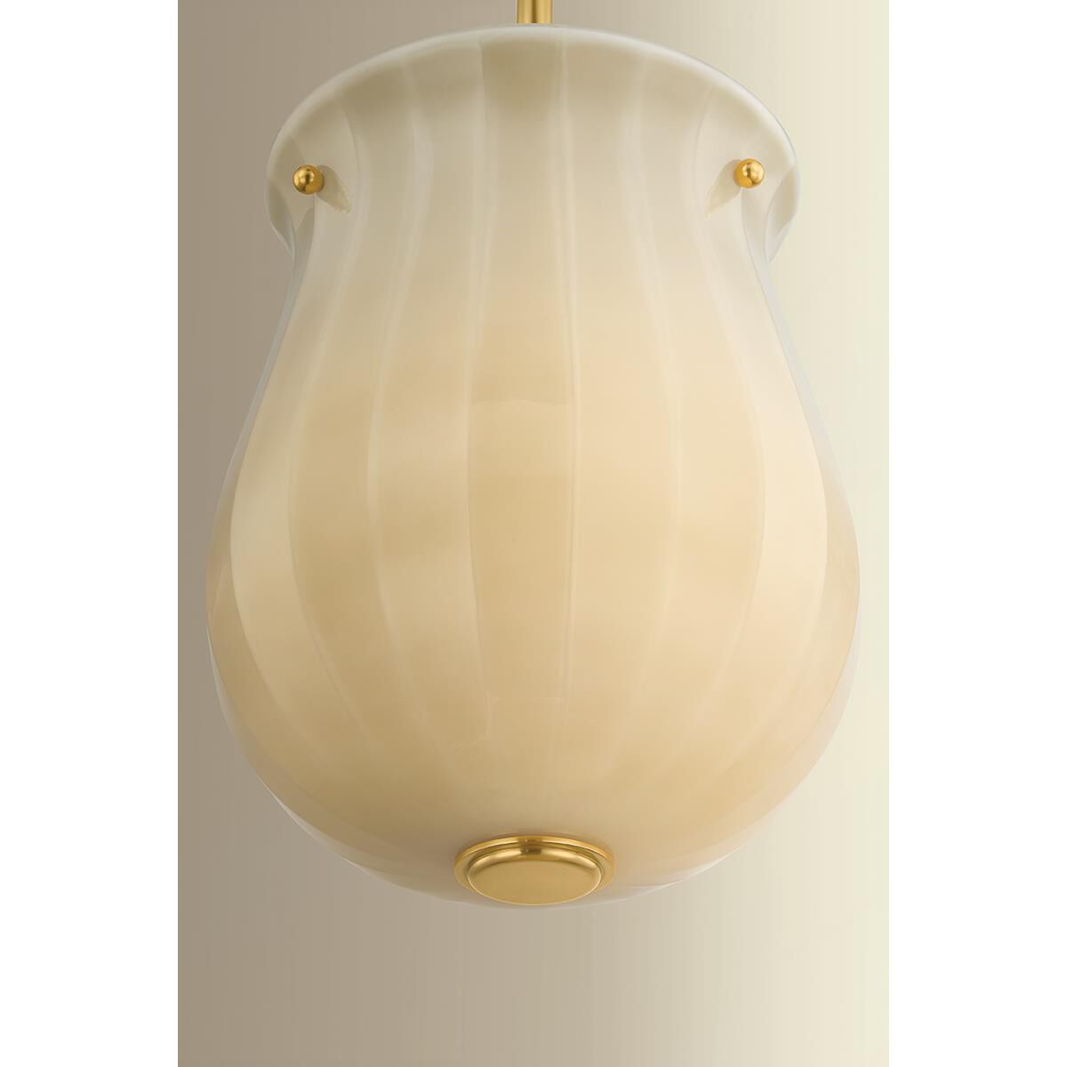 Shown in Aged Brass finish and Champagne glass