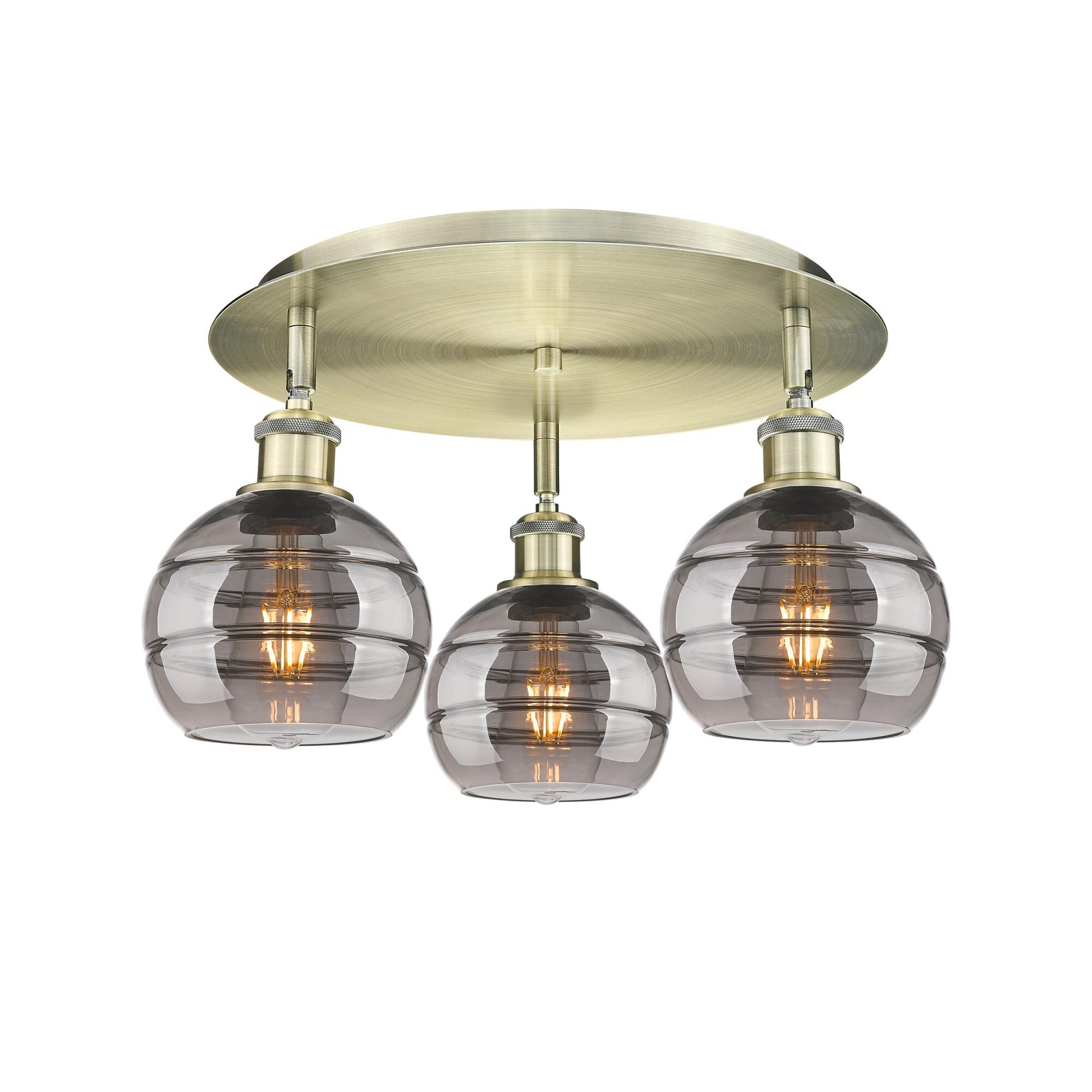 Shown in Antique Brass finish and Light Smoke glass