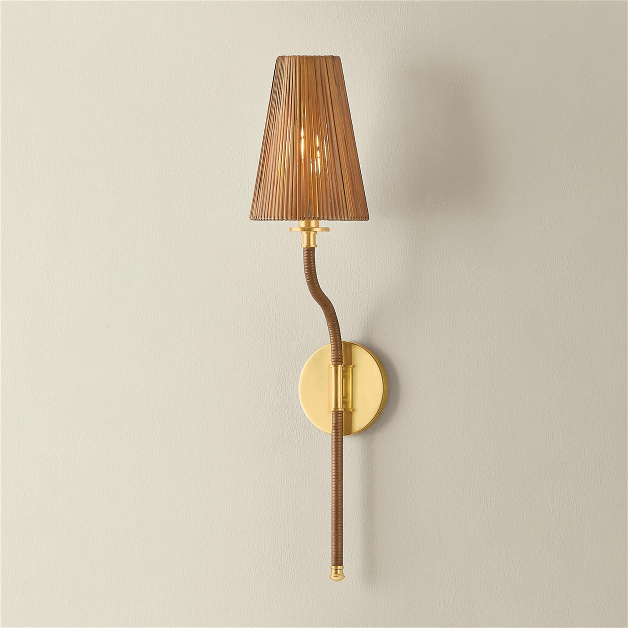 Shown in Aged Brass finish and Natural Woven Rattan shade