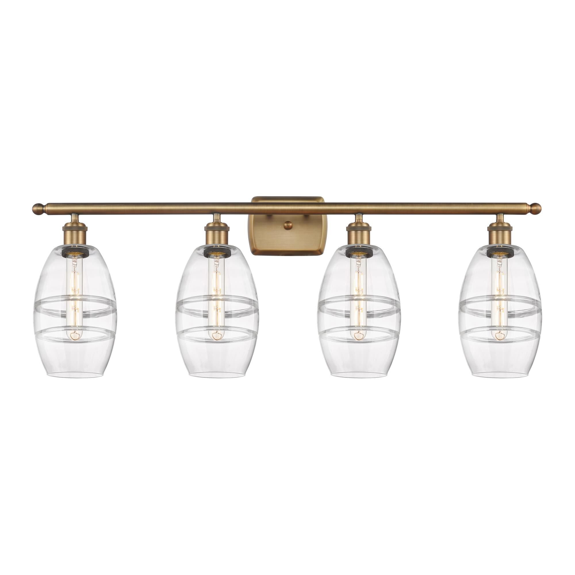 Shown in Brushed Brass finish and Clear glass