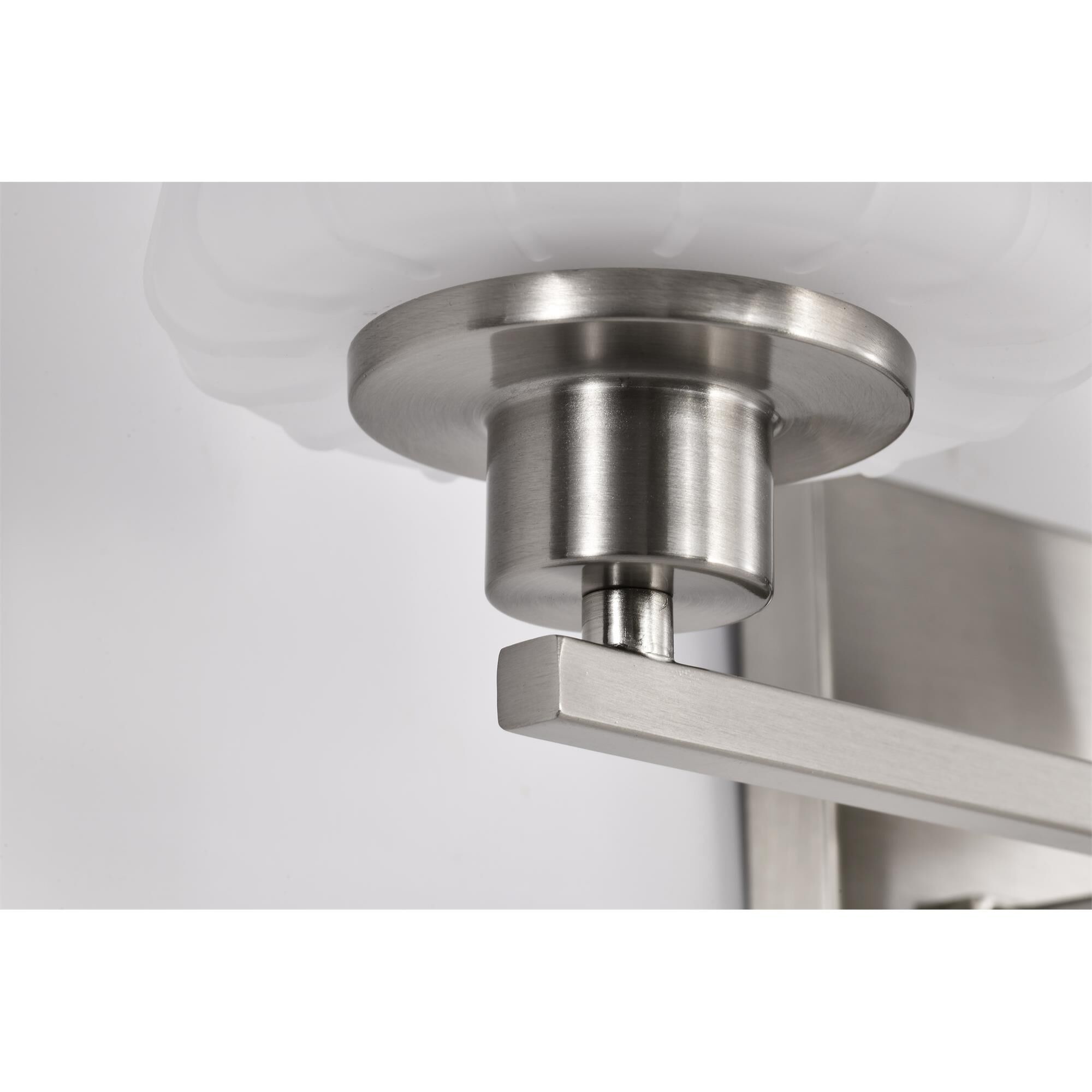Shown in Brushed Nickel finish and Etched White glass