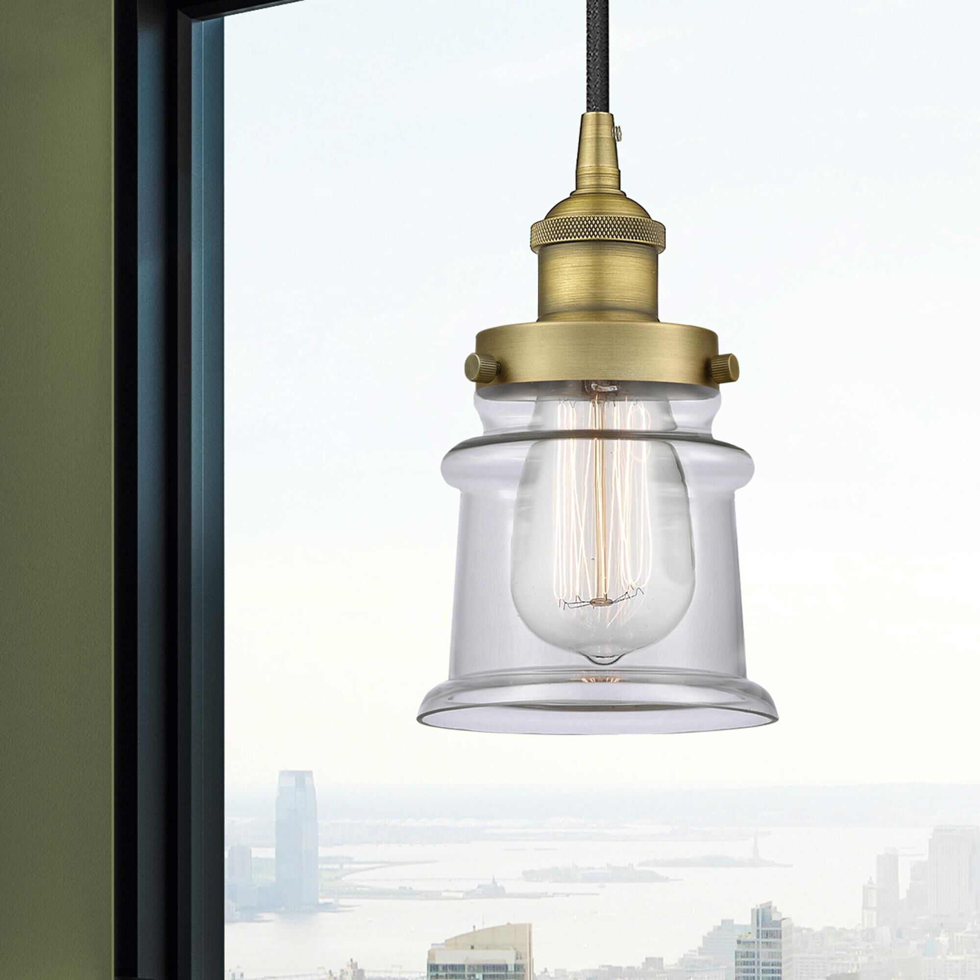 Shown in Brushed Brass finish and Clear glass