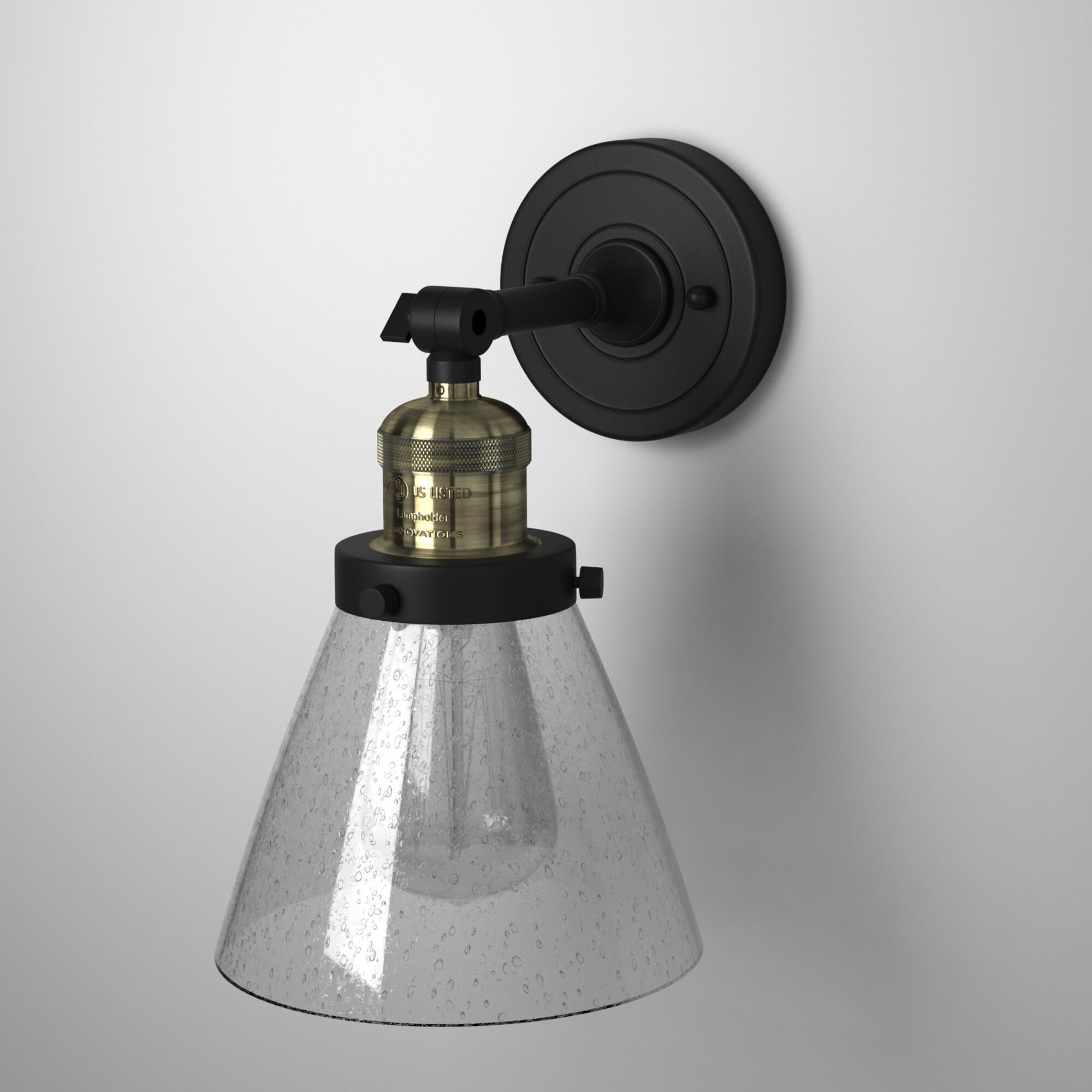 Shown in Black Antique Brass finish and Seedy glass