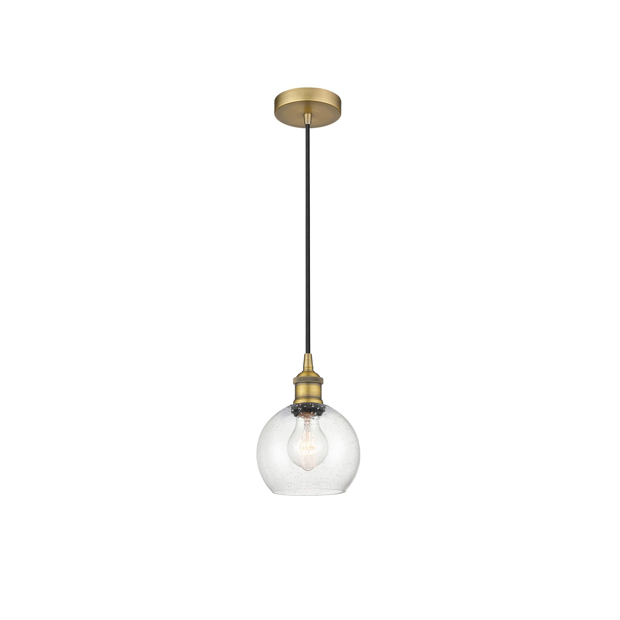Shown in Brushed Brass finish and Seedy glass