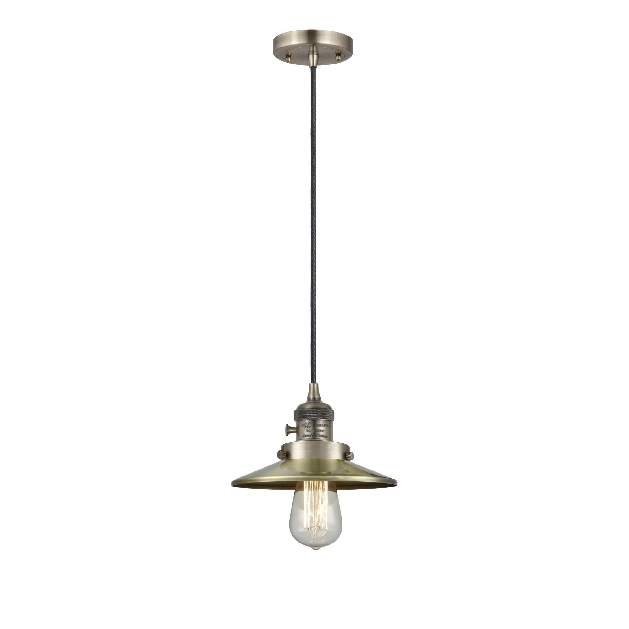 Shown in Antique Brass finish and Antique Brass shade