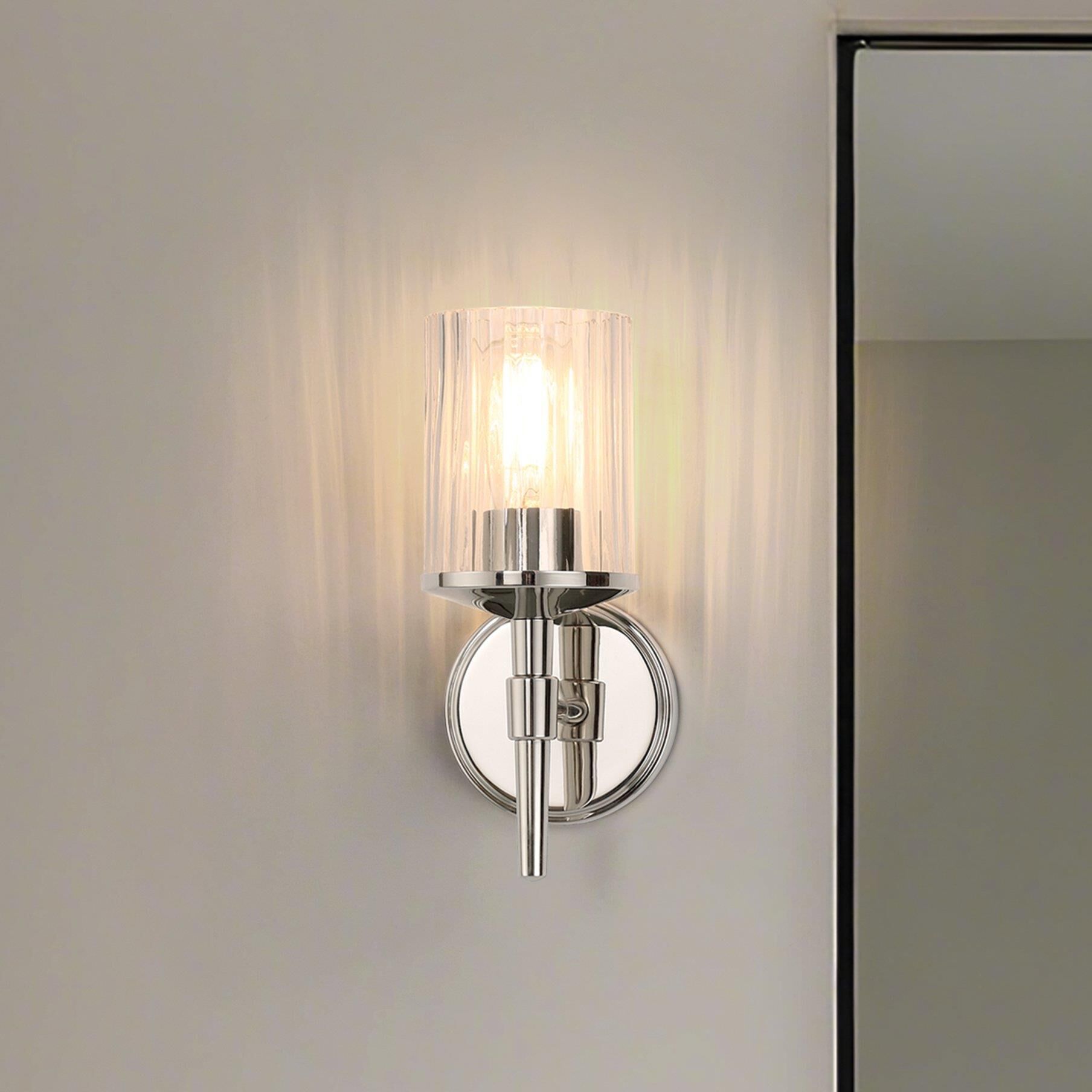 Shown in Polished Nickel finish and Clear Ribbed glass