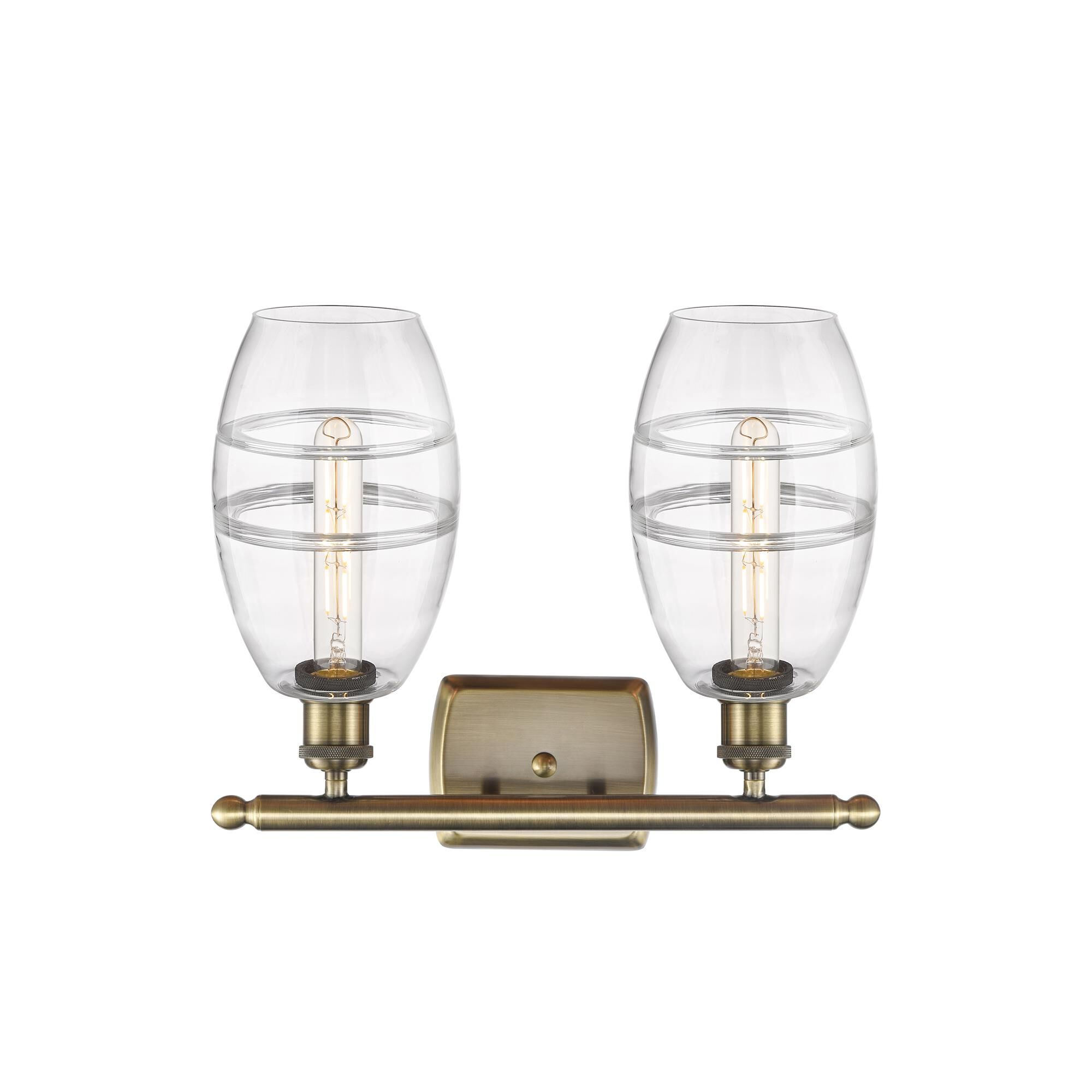 Shown in Antique Brass finish and Clear glass