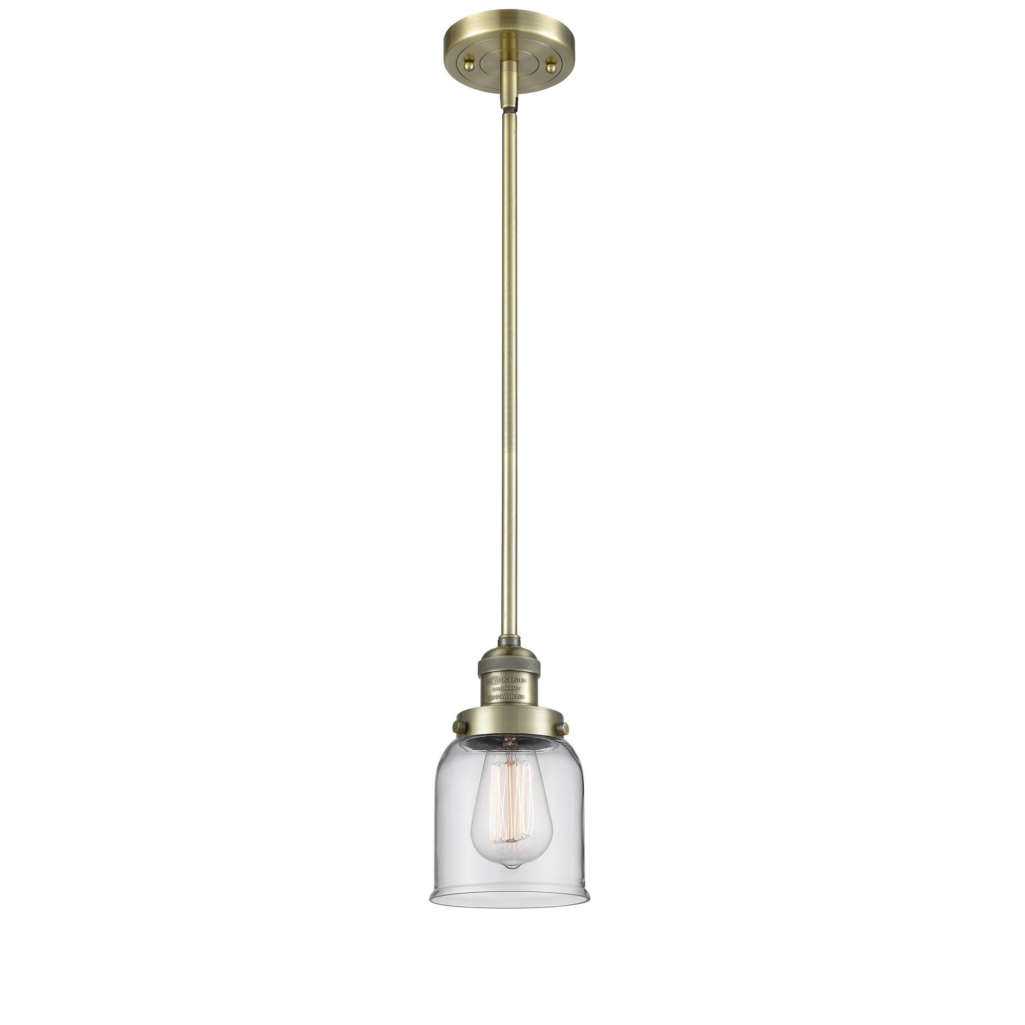 Shown in Antique Brass finish and Clear glass