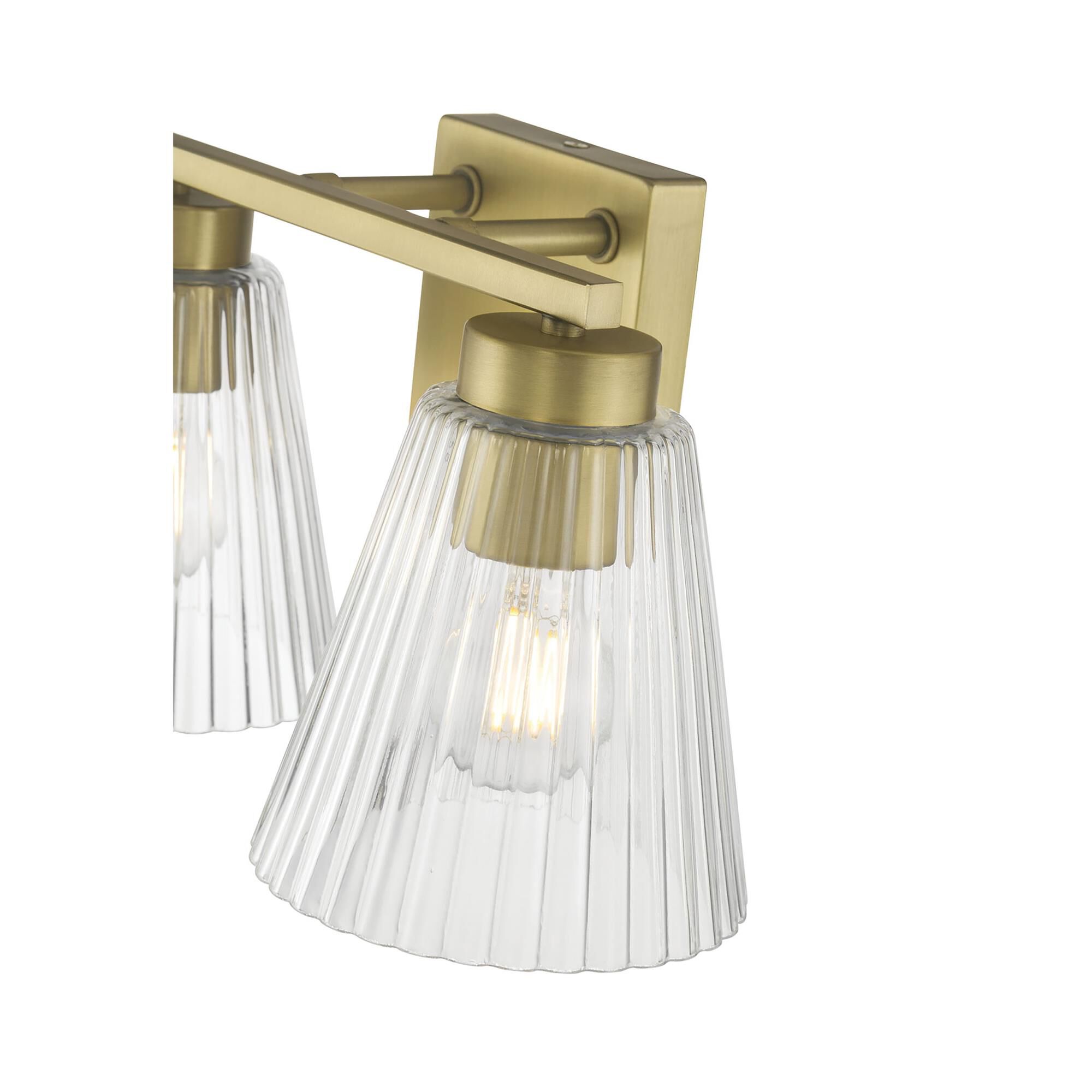 Shown in Vintage Brass finish and Clear Striated glass