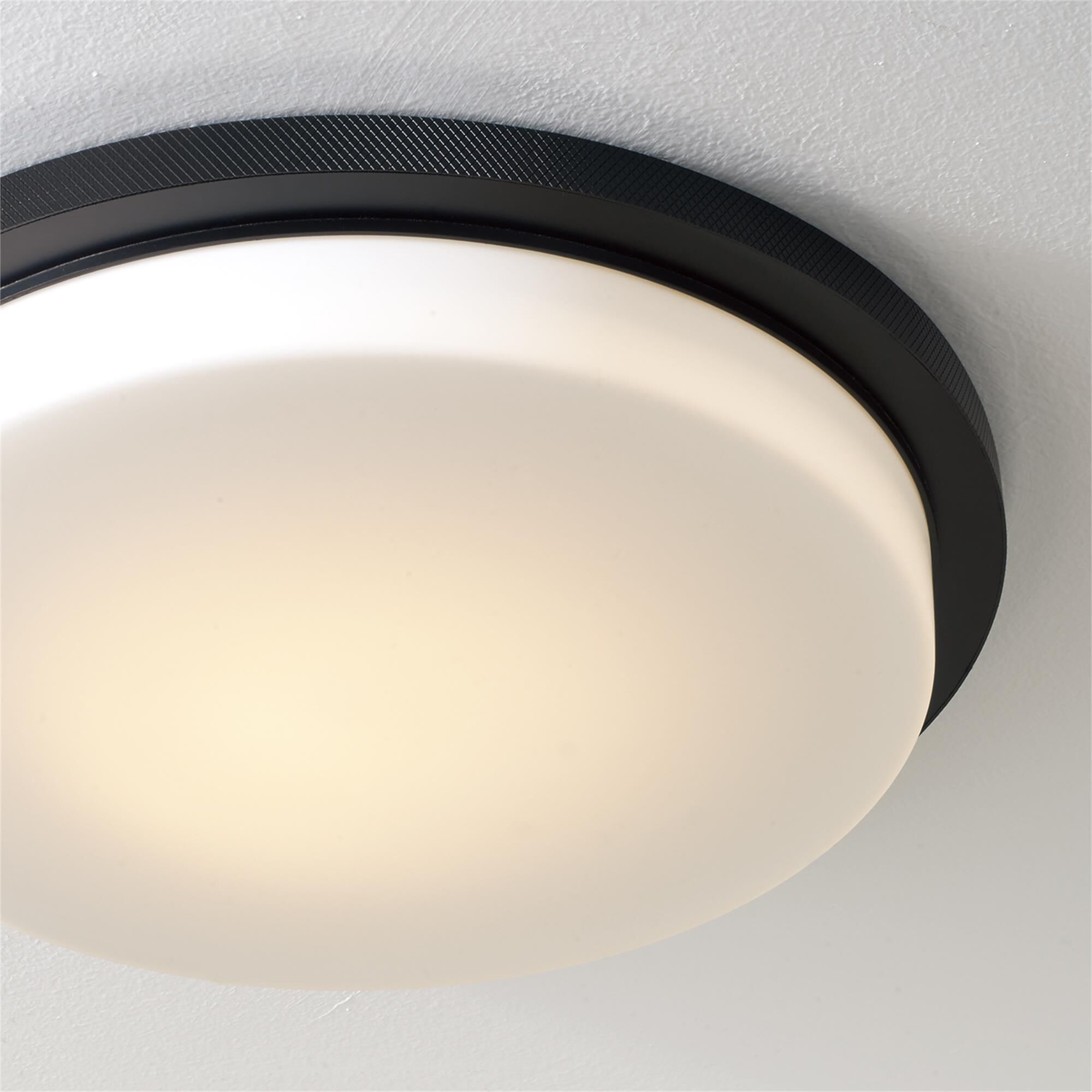 Shown in Matte Black finish and Soft White glass