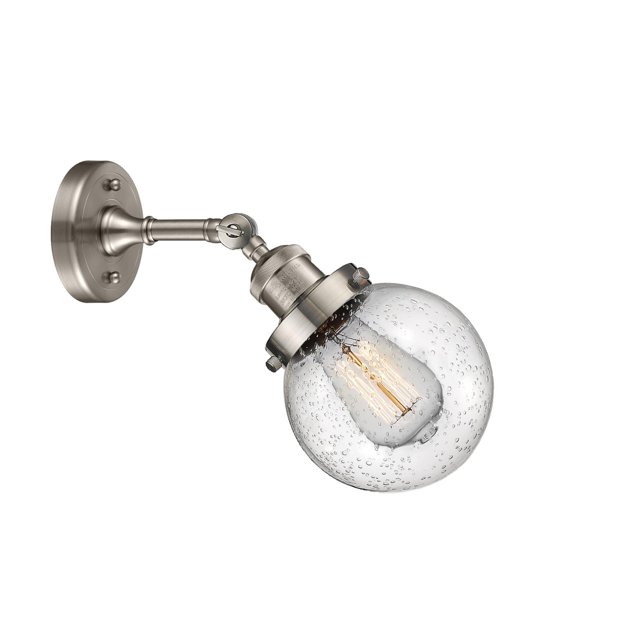 Shown in Brushed Satin Nickel finish and Seedy glass and No Accent accent