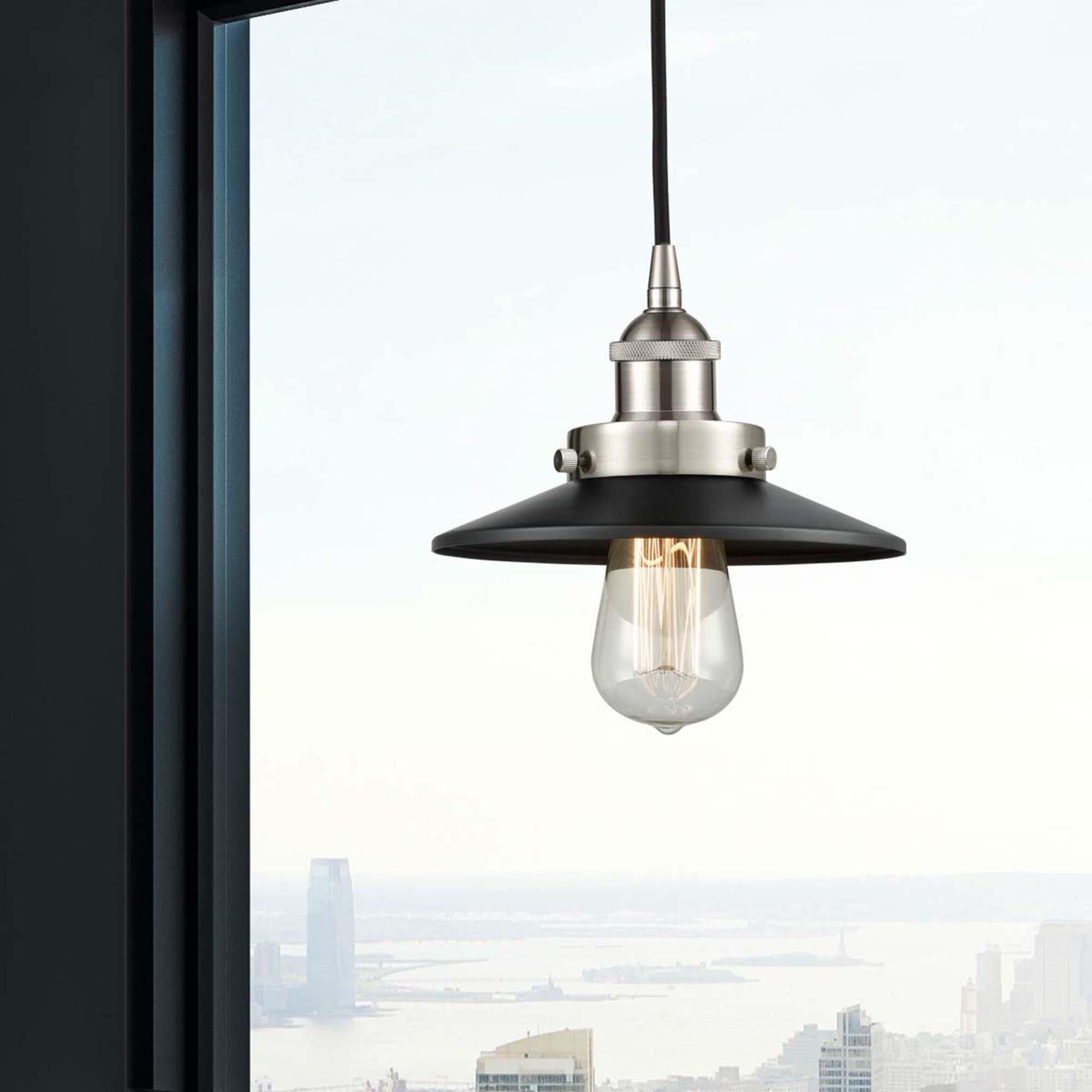 Shown in Brushed Satin Nickel finish and Brushed Satin Nickel Railroad shade