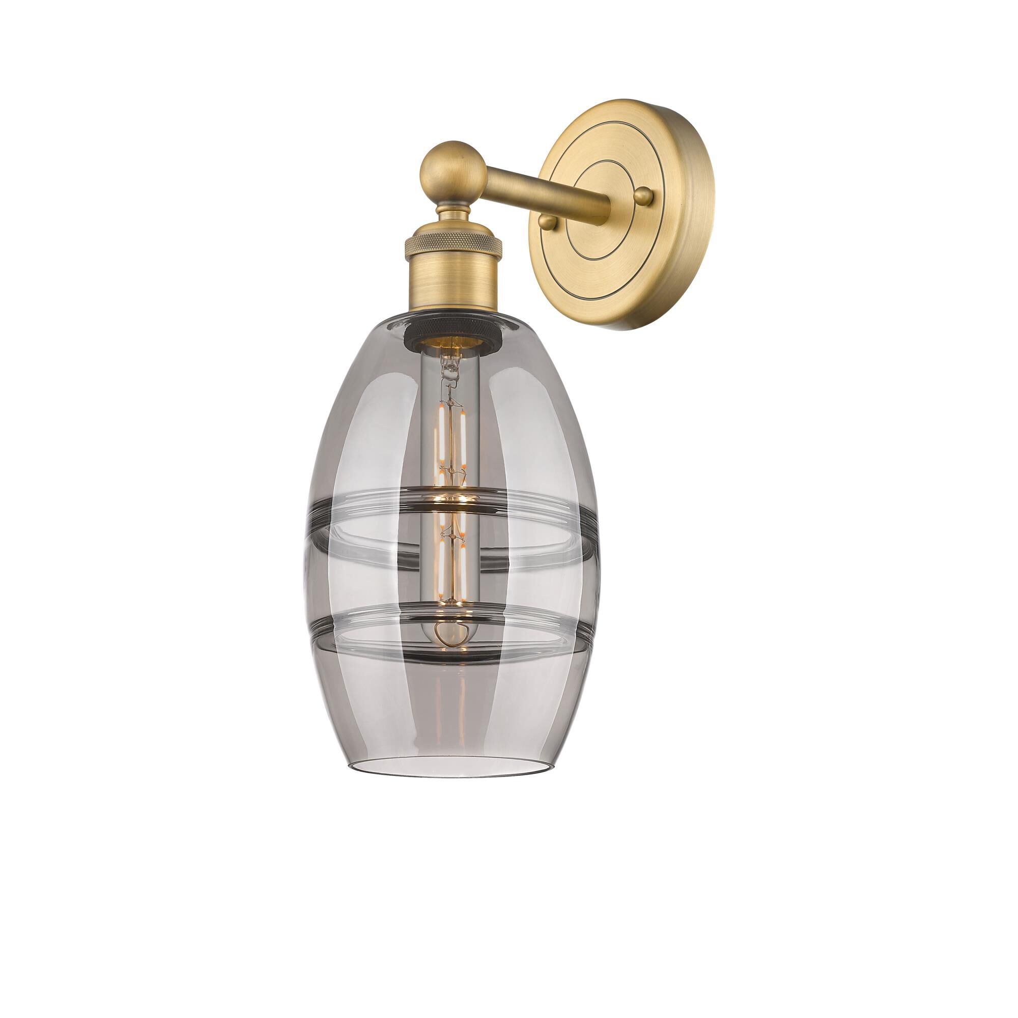 Shown in Brushed Brass finish and Light Smoke glass