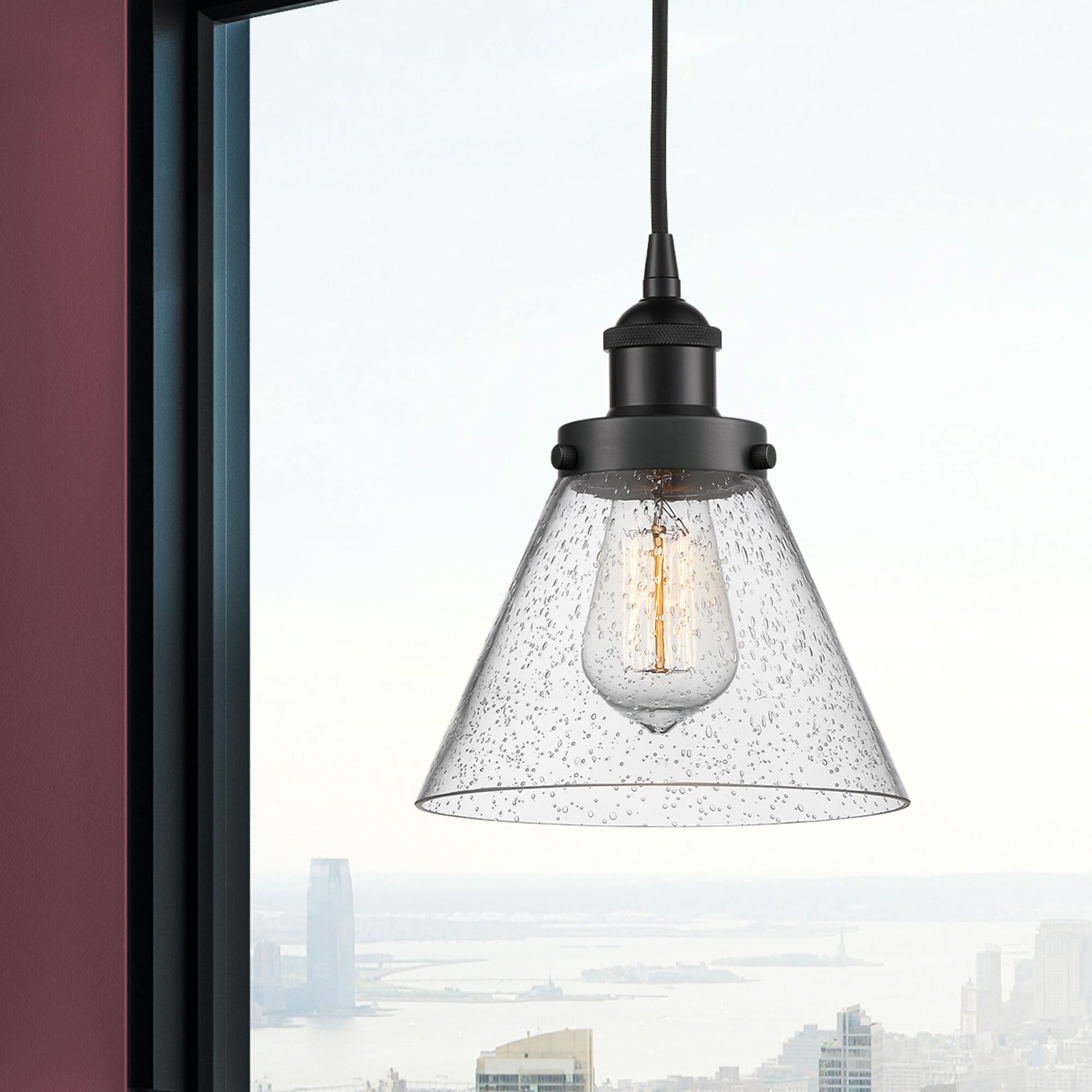 Shown in Matte Black finish and Seedy glass