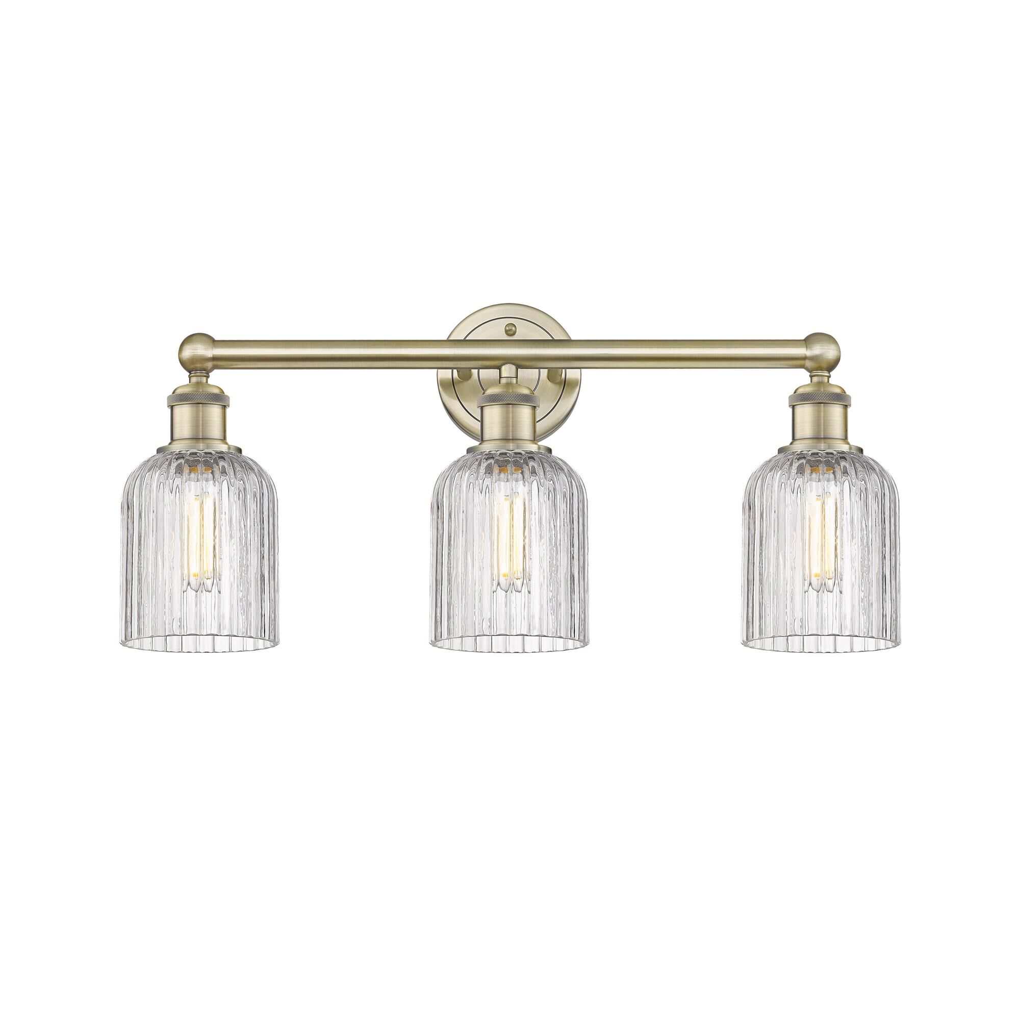 Shown in Antique Brass finish and Clear glass