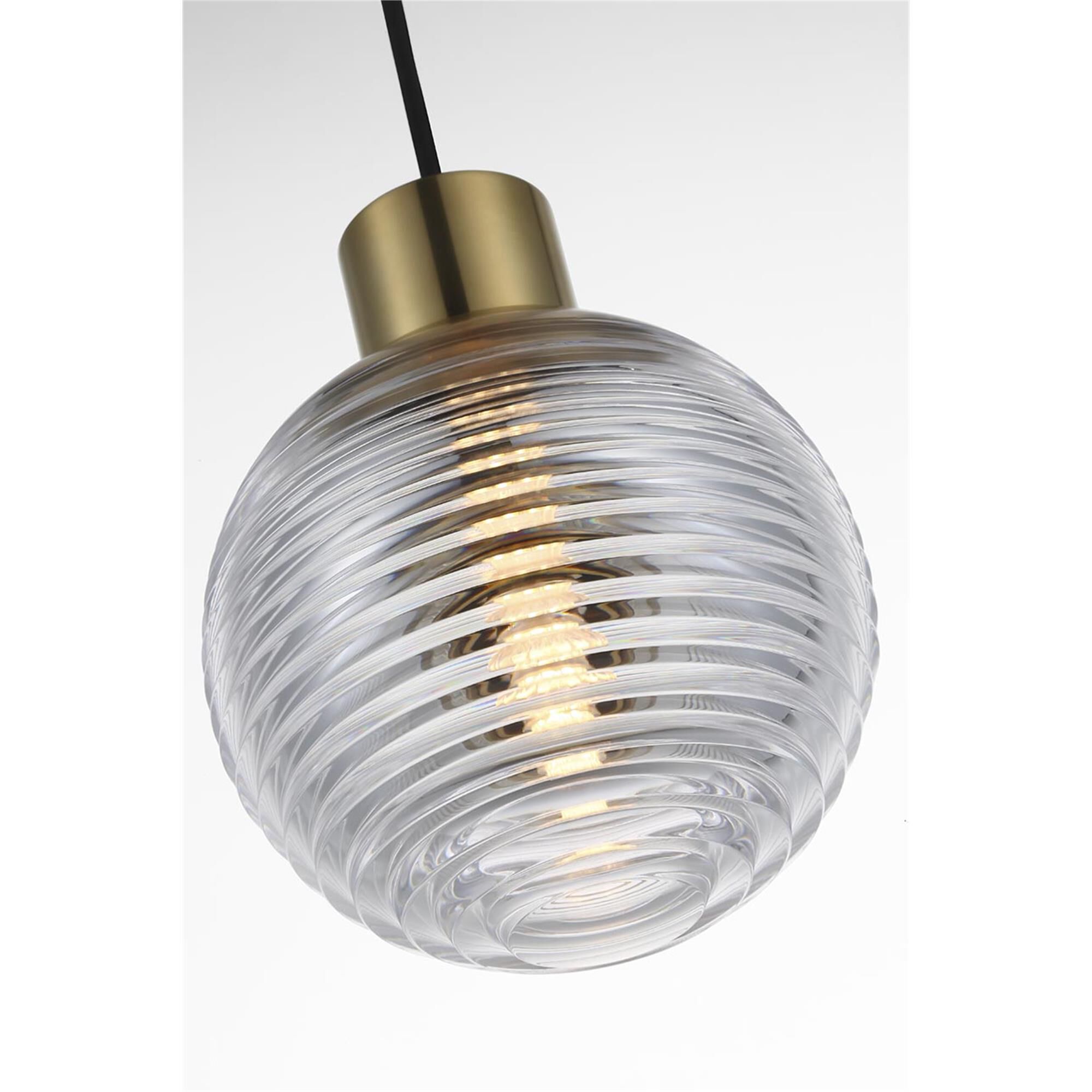 Shown in Natural Brass finish and Clear crystal