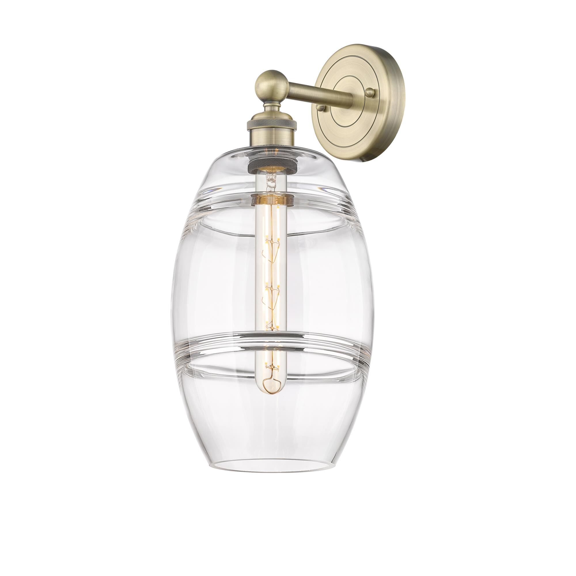 Shown in Antique Brass finish and Clear glass