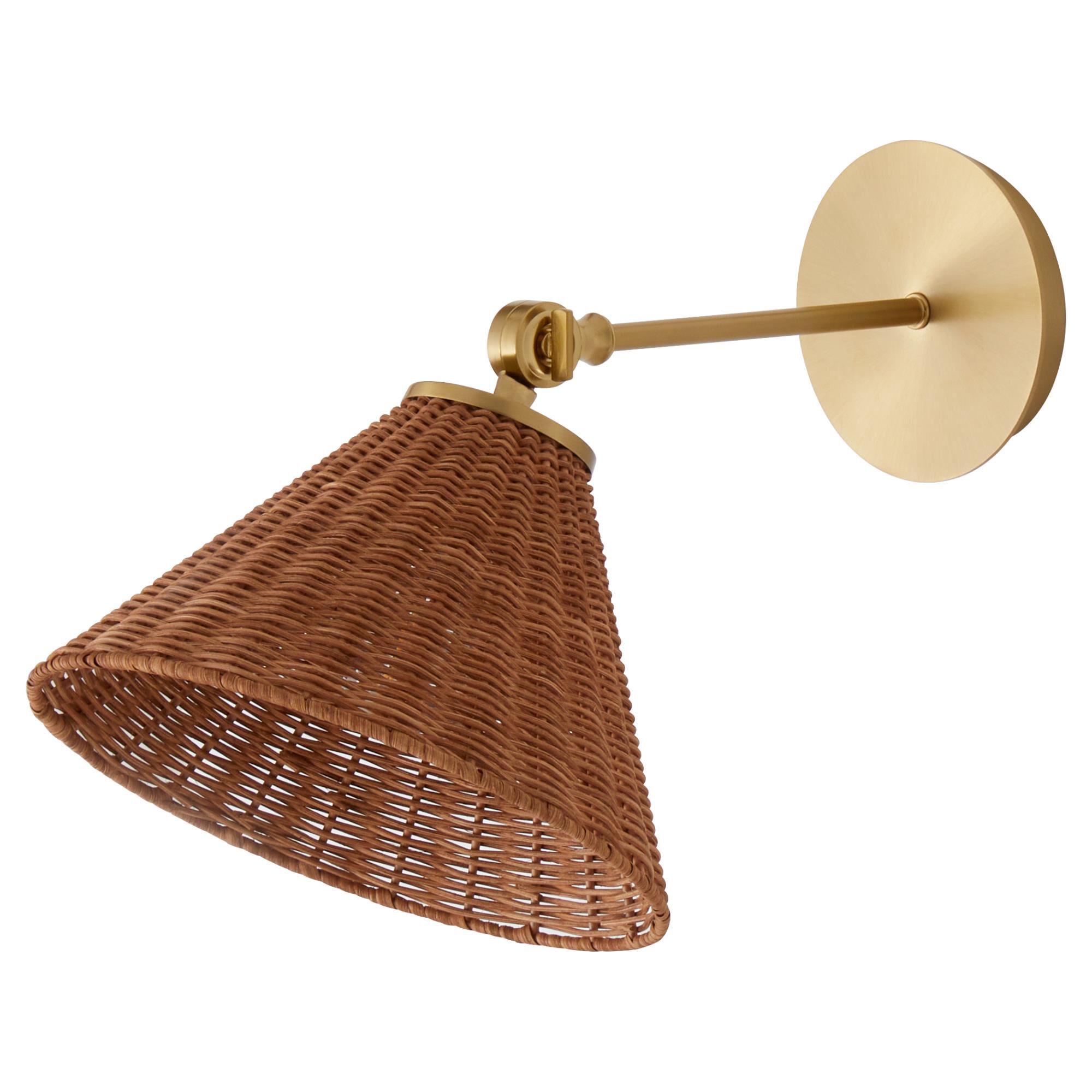 Shown in Aged Brass finish and Wicker shade