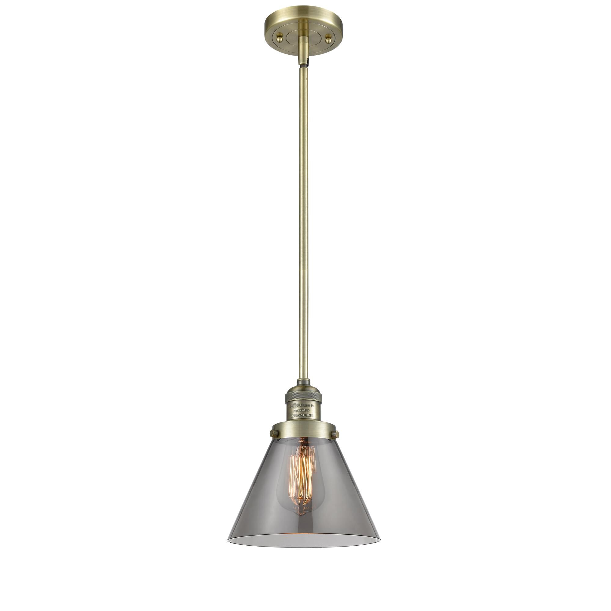 Shown in Antique Brass finish and Smoked glass