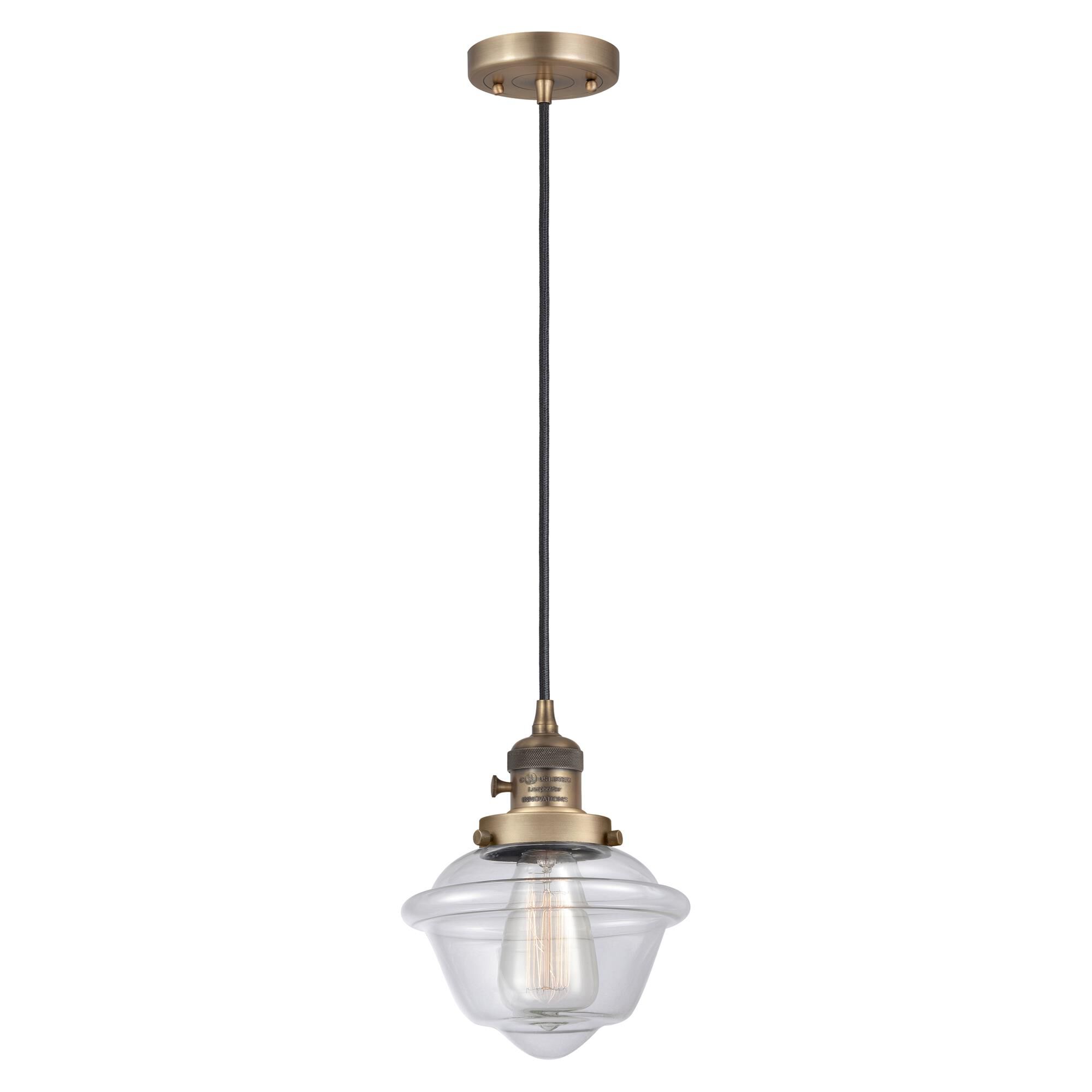 Shown in Brushed Brass finish and Clear glass