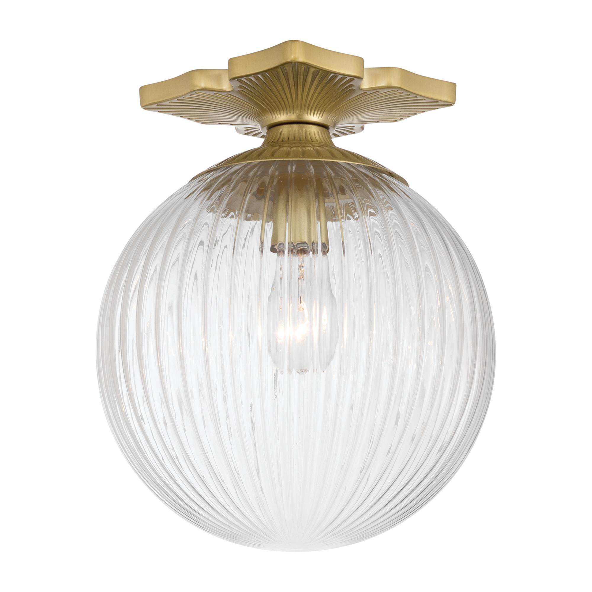 Shown in Aged Brass finish and Ribbed glass and Ribbed Glass shade