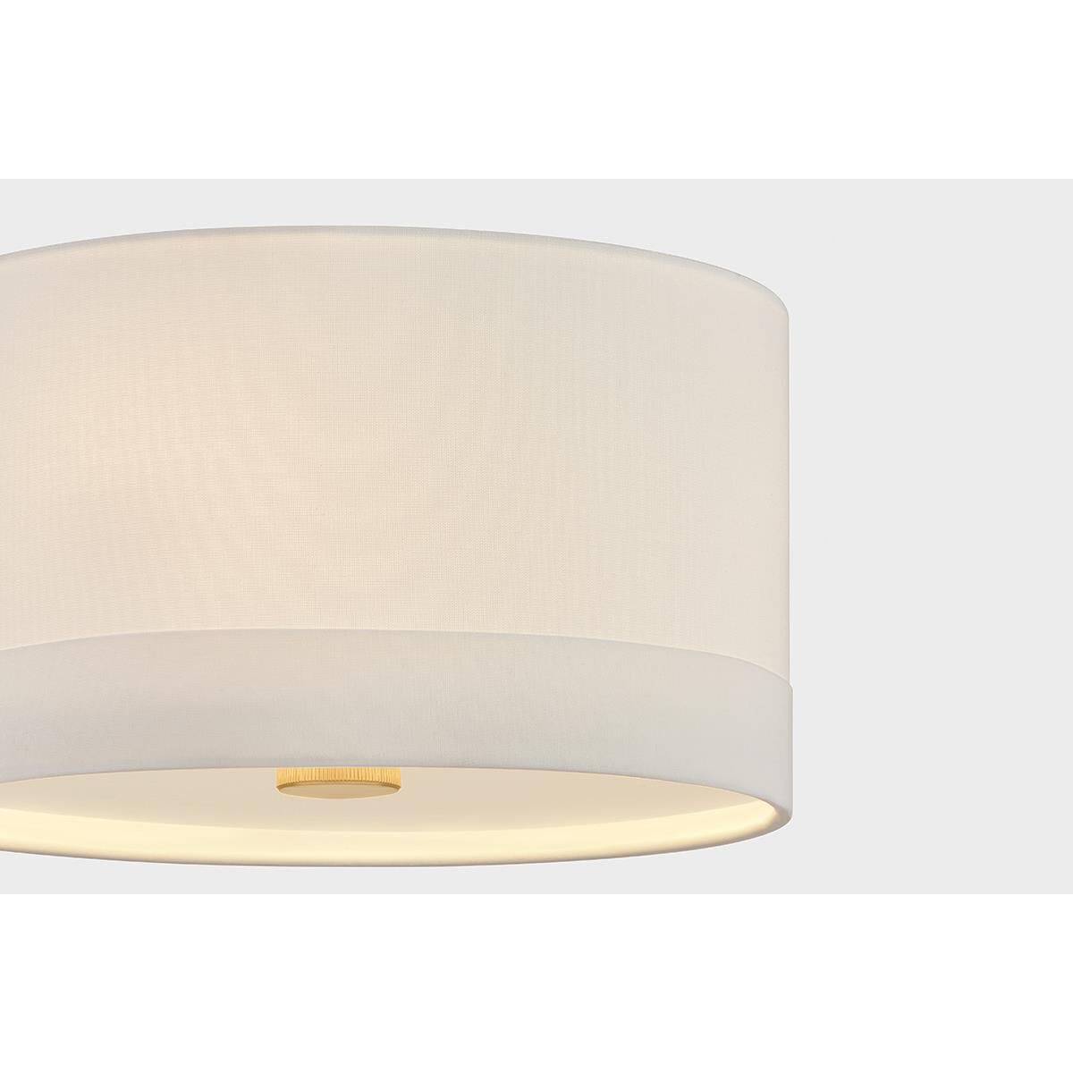 Shown in Aged Brass finish and White Linen shade