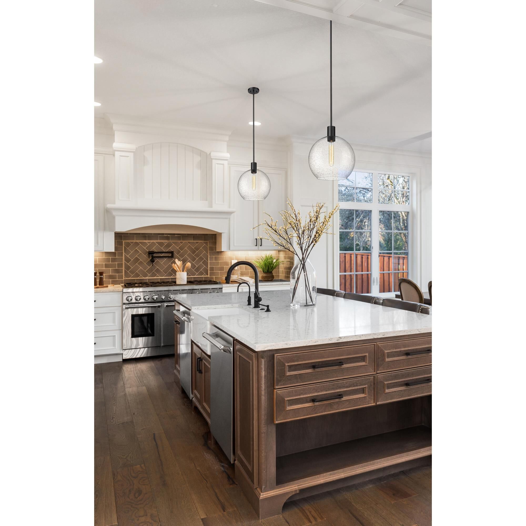 Shown in Matte Black finish and Clear Seedy glass and Clear Seedy shade