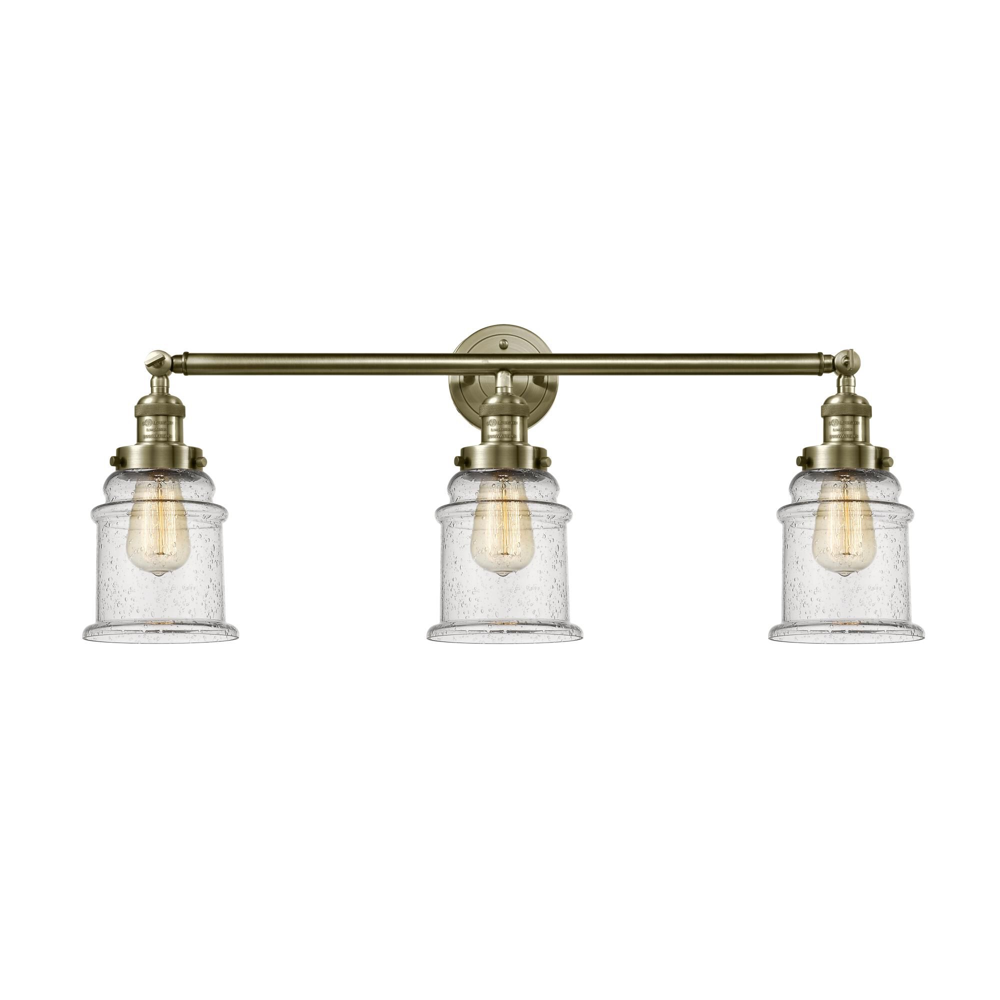 Shown in Antique Brass finish and Seedy glass