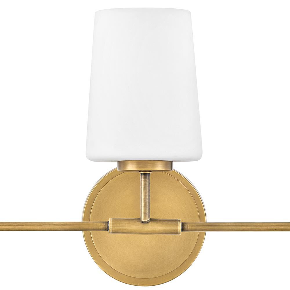 Shown in Heritage Brass finish and White glass