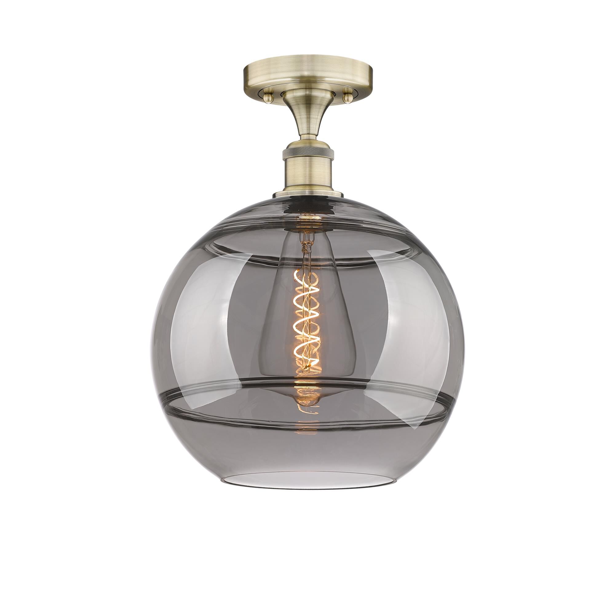 Shown in Antique Brass finish and Light Smoke glass
