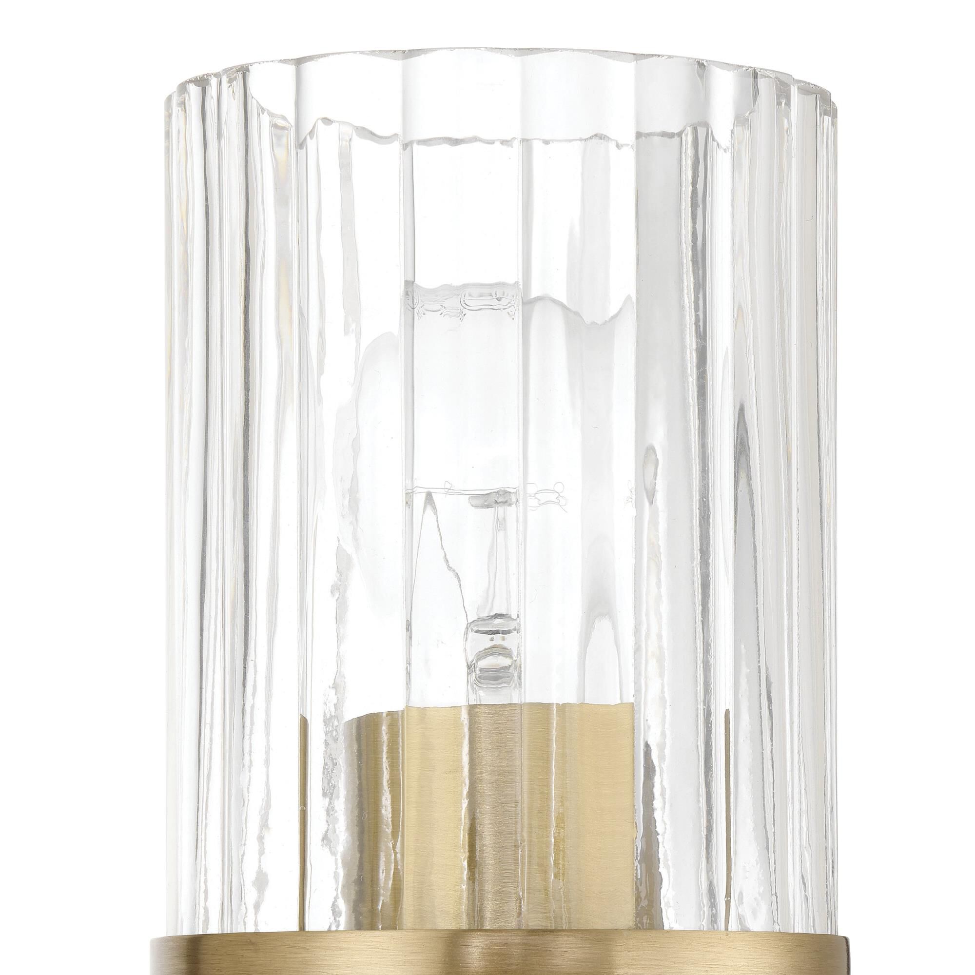 Shown in Champagne Gold finish and Clear Ribbed glass
