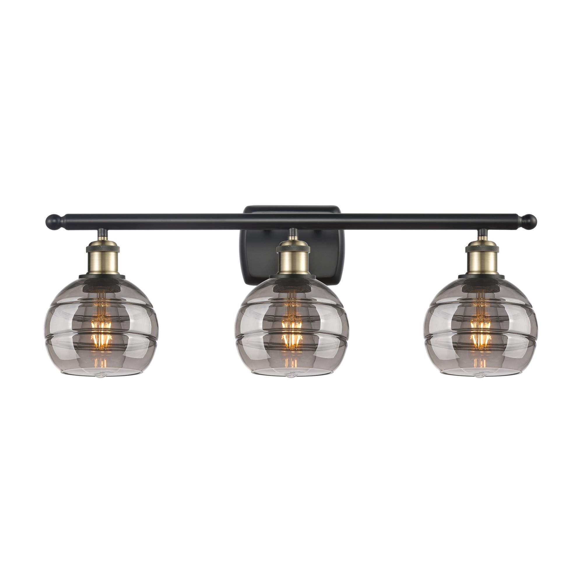 Shown in Black Antique Brass finish and Light Smoke glass