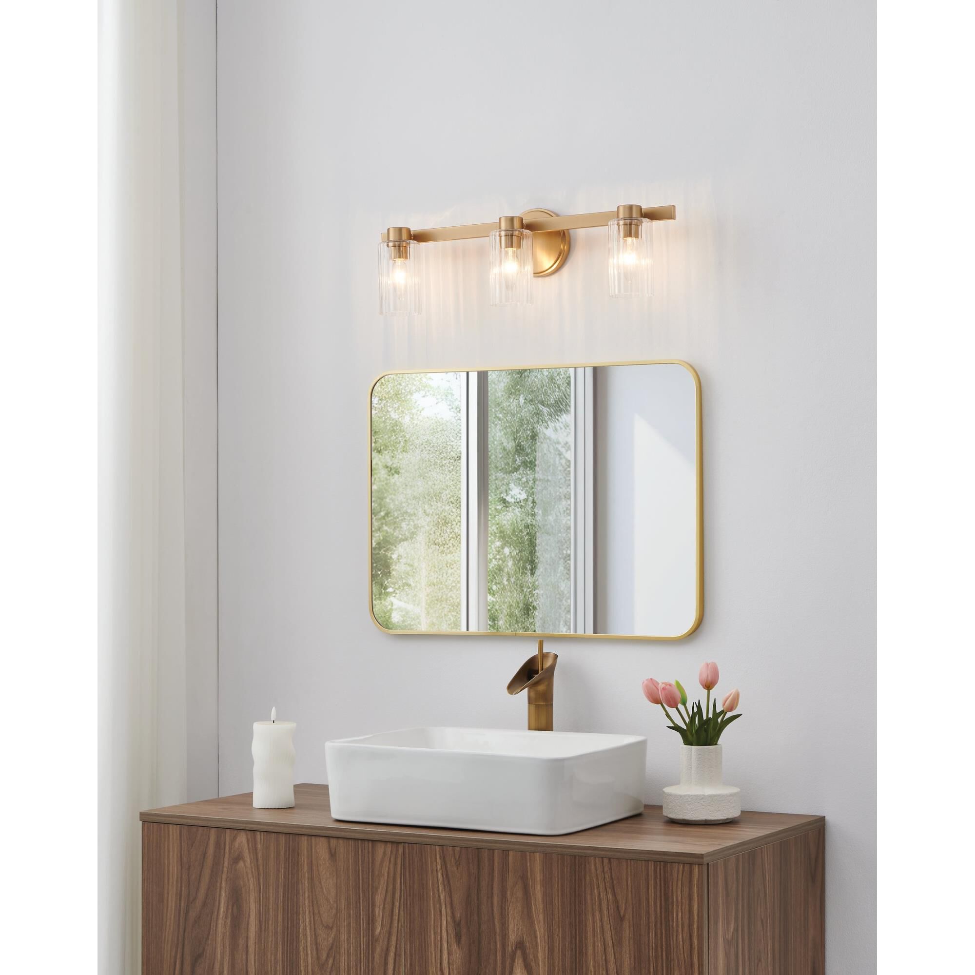 Shown in Champagne Gold finish and Clear Ribbed glass