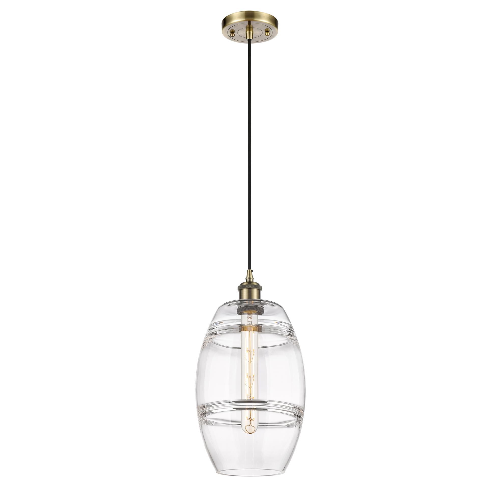 Shown in Antique Brass finish and Clear glass