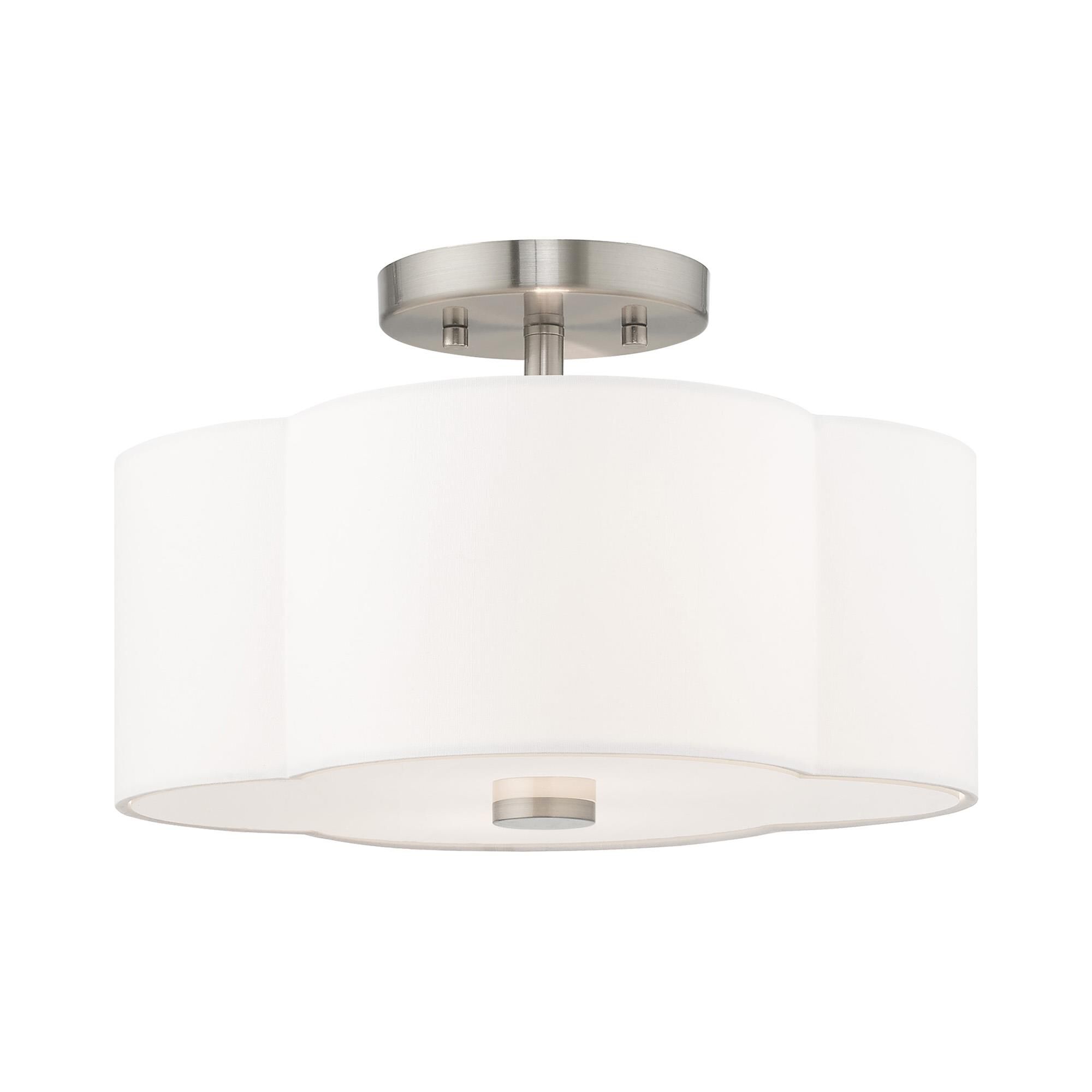 Shown in Brushed Nickel finish and Hand Crafted Off-White Fabric Hardback shade