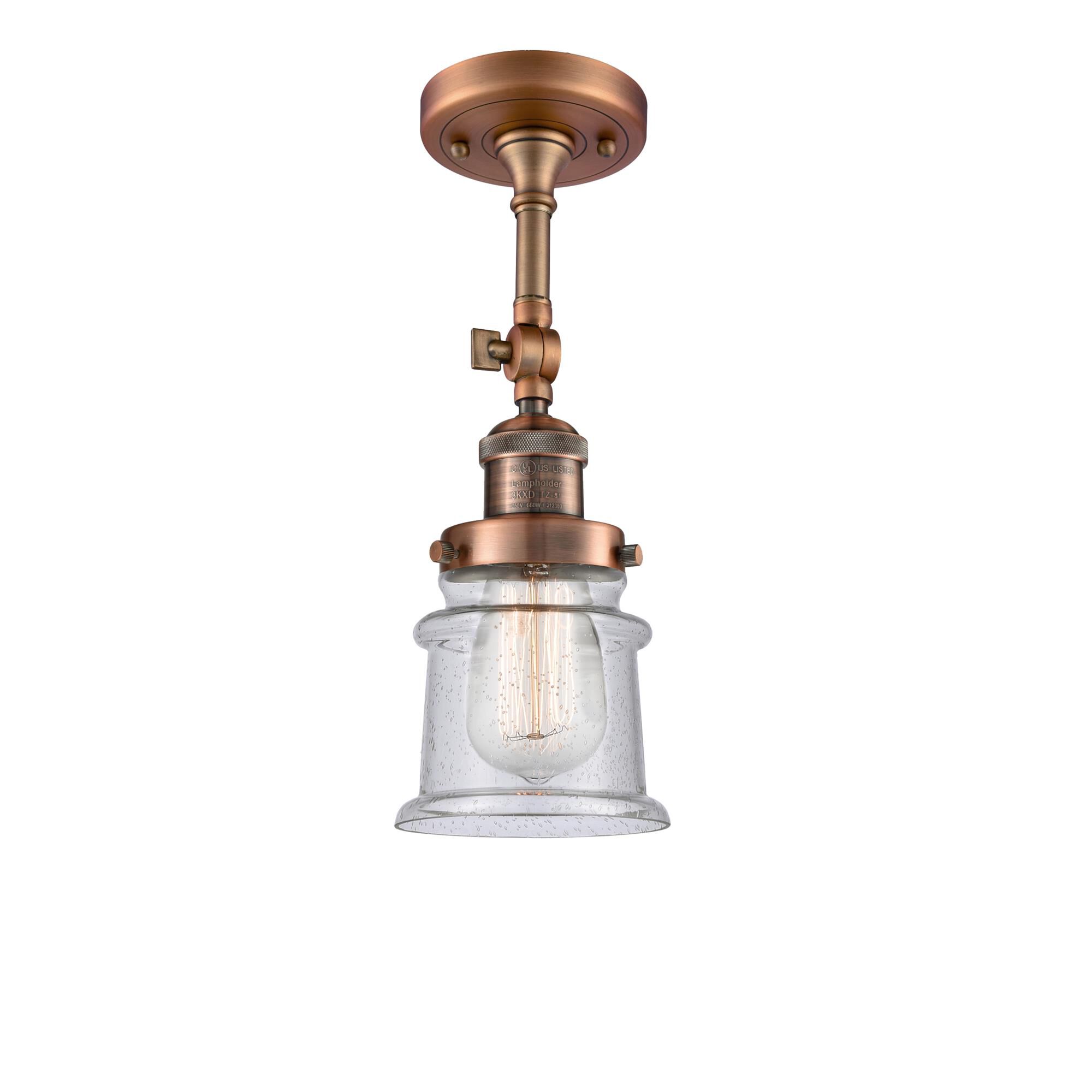 Shown in Antique Copper finish and Seedy glass and None accent