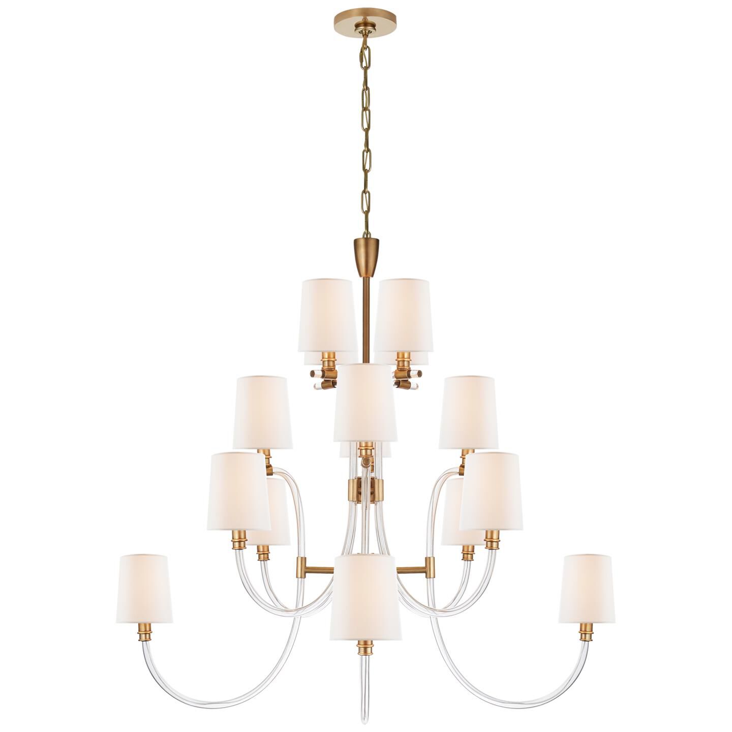 Shown in Crystal With Antique Brass finish and Linen shade