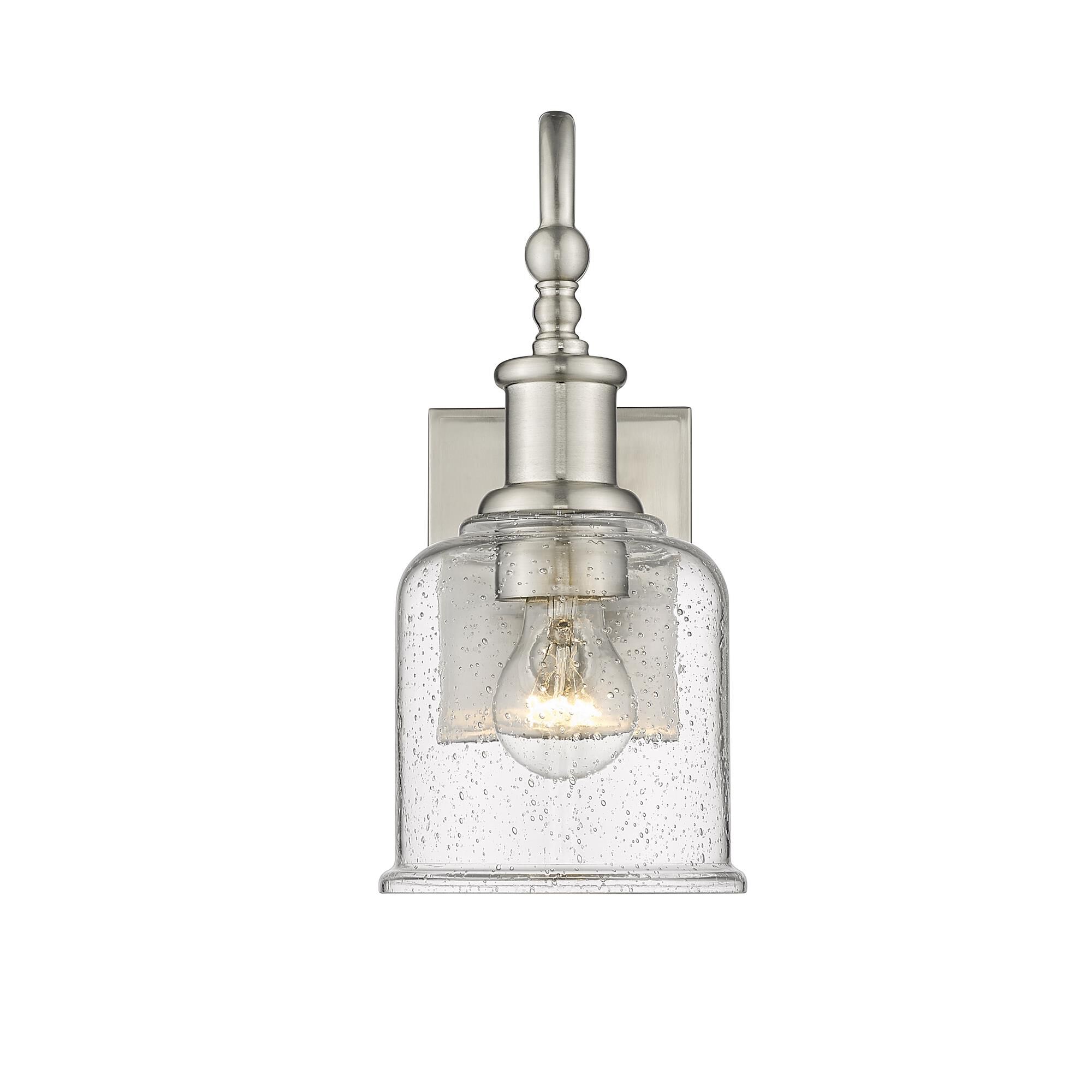 Shown in Brushed Nickel finish and Glass shade