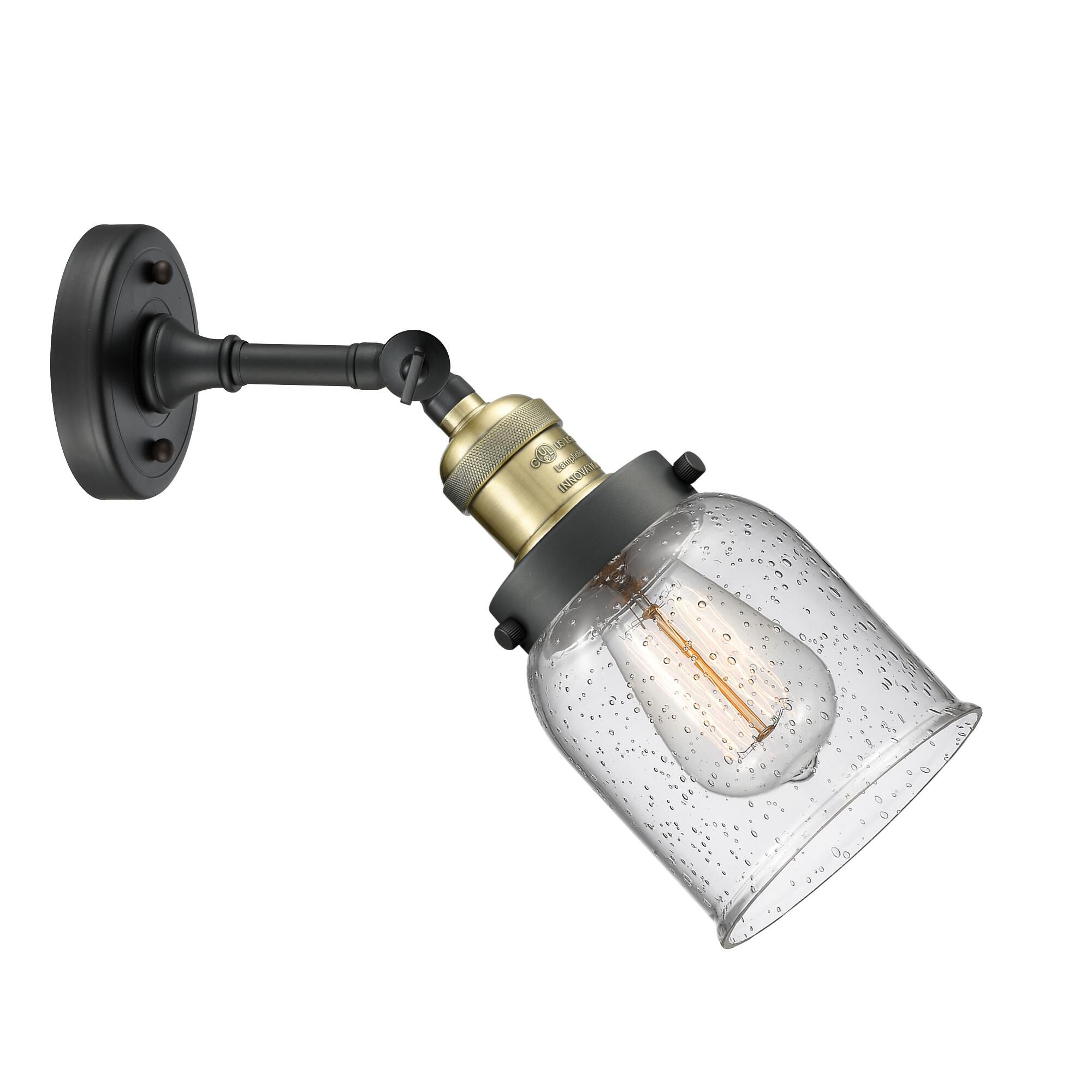 Shown in Black Antique Brass finish and Seedy glass and None accent