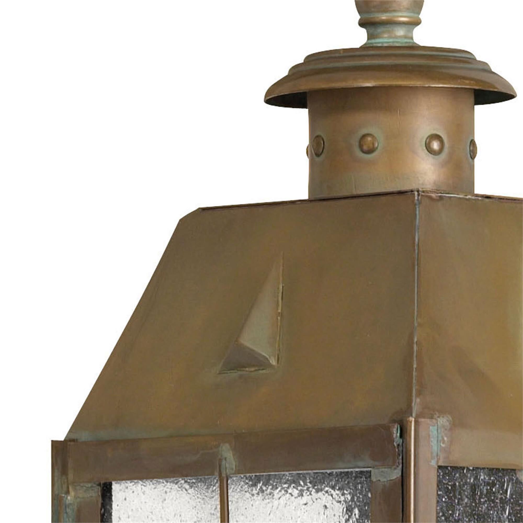 Shown in Aged Brass finish and Clear Seedy Panels glass