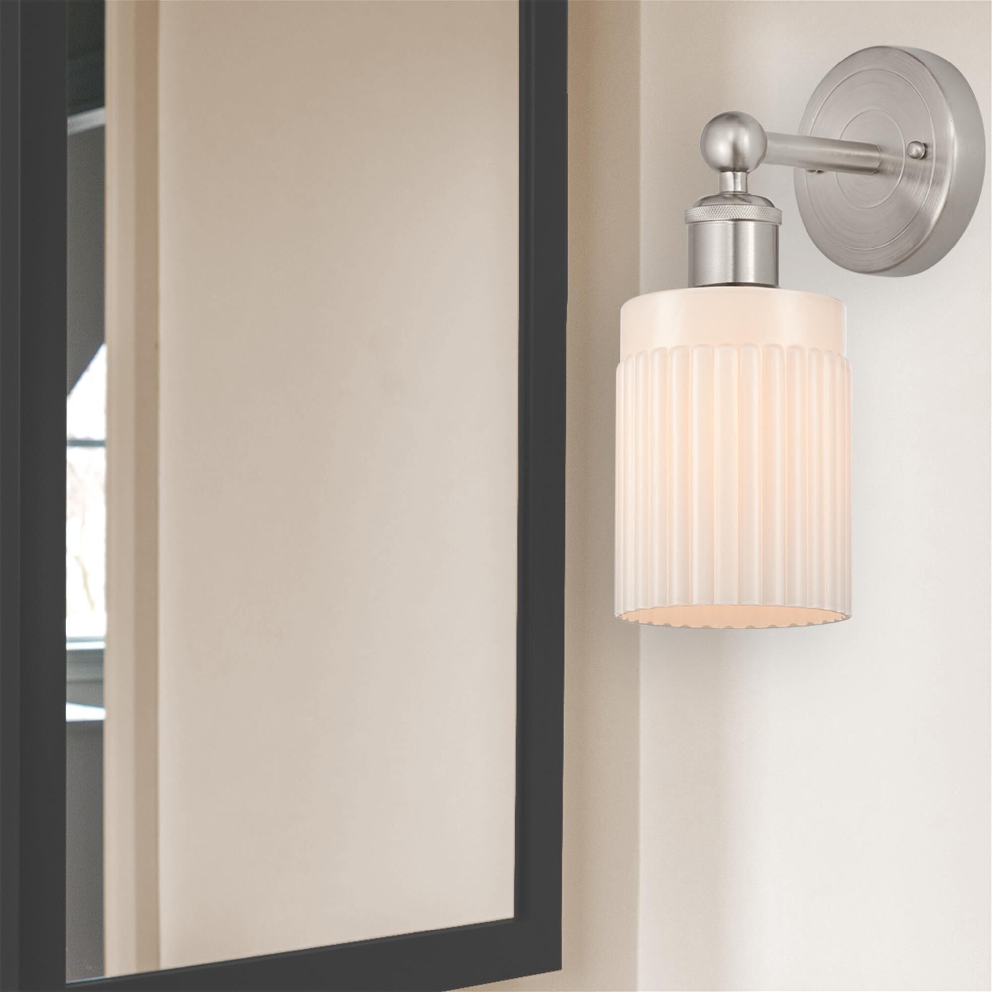 Shown in Brushed Satin Nickel  finish and Matte White glass