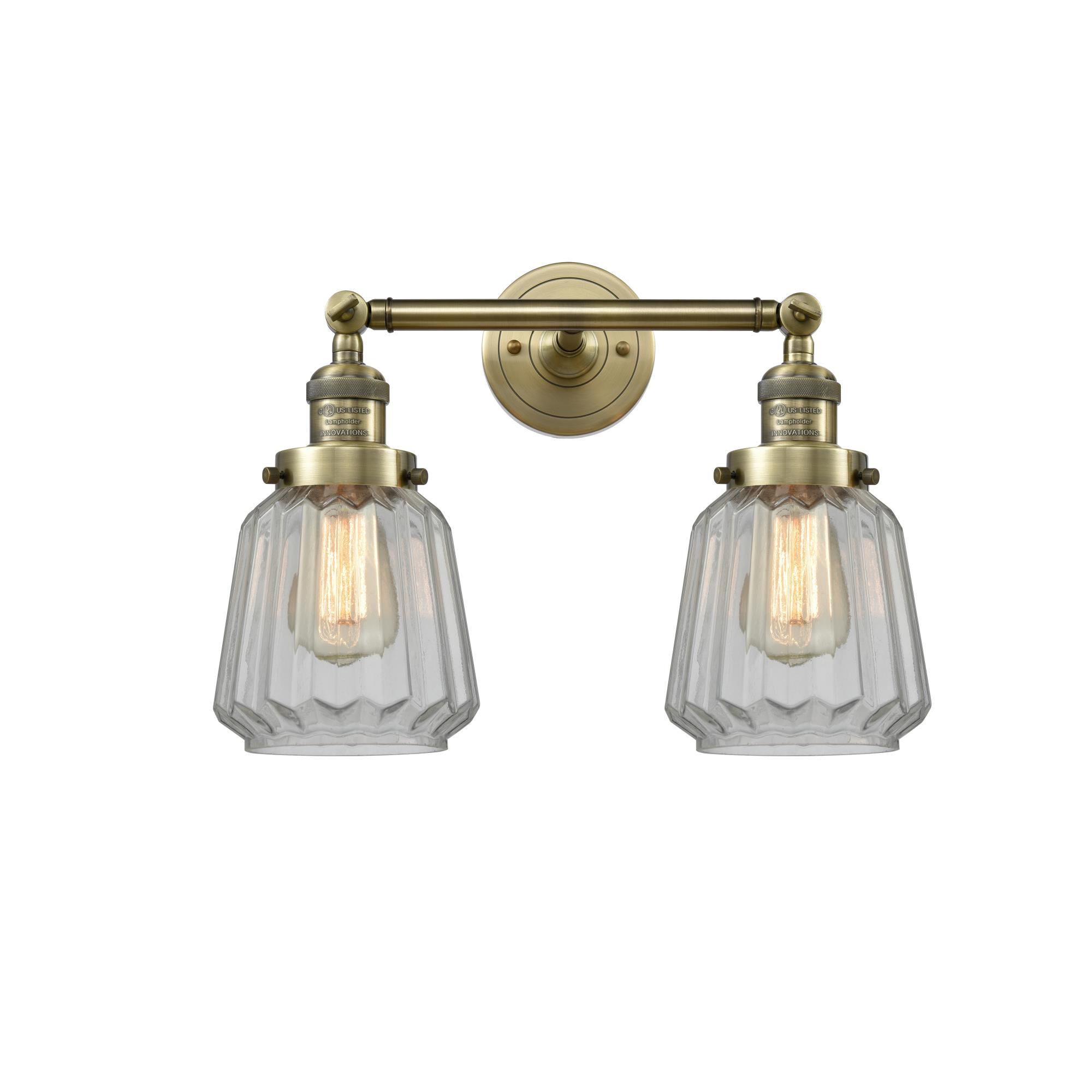 Shown in Antique Brass finish and Clear glass