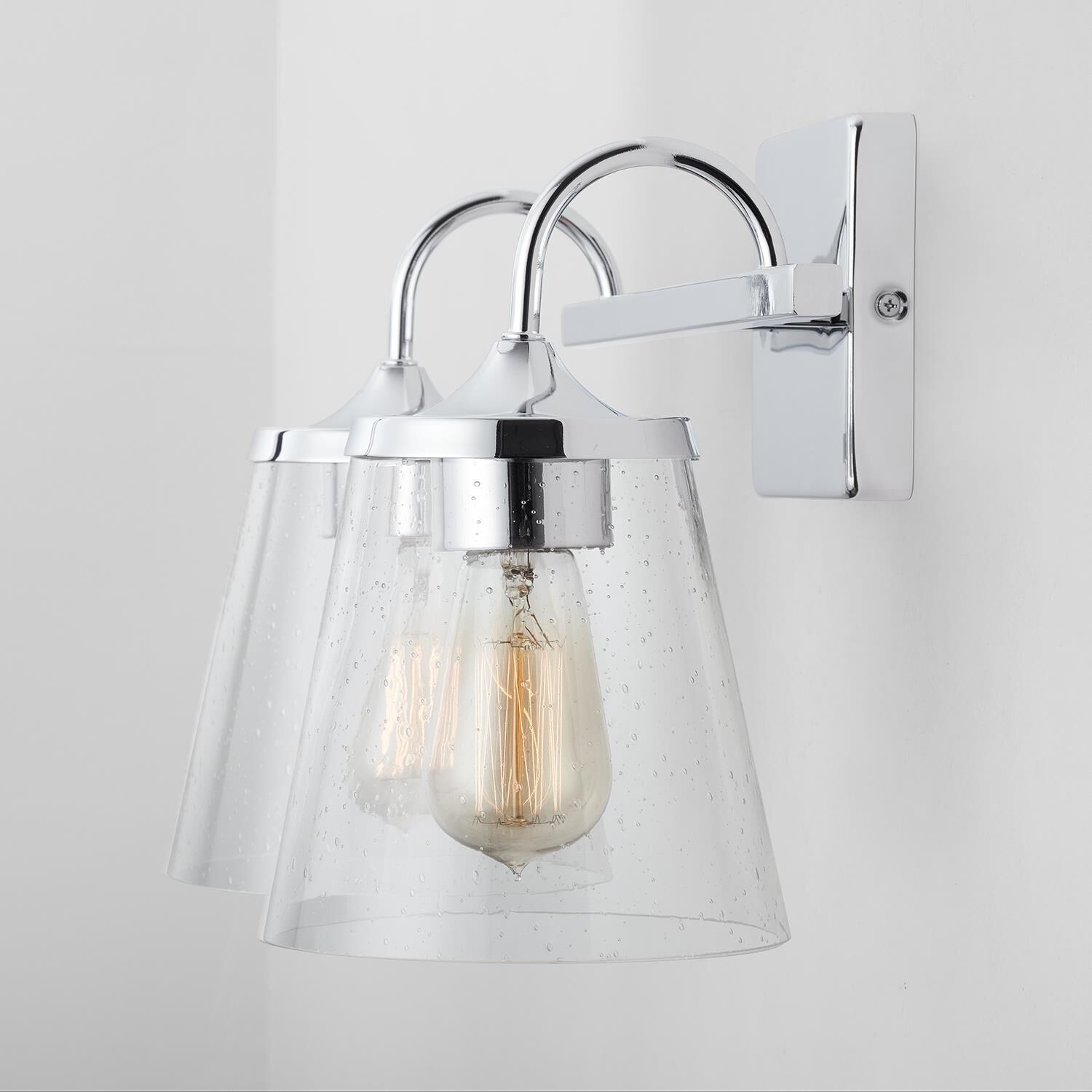 Shown in Chrome finish and Clear Seeded glass