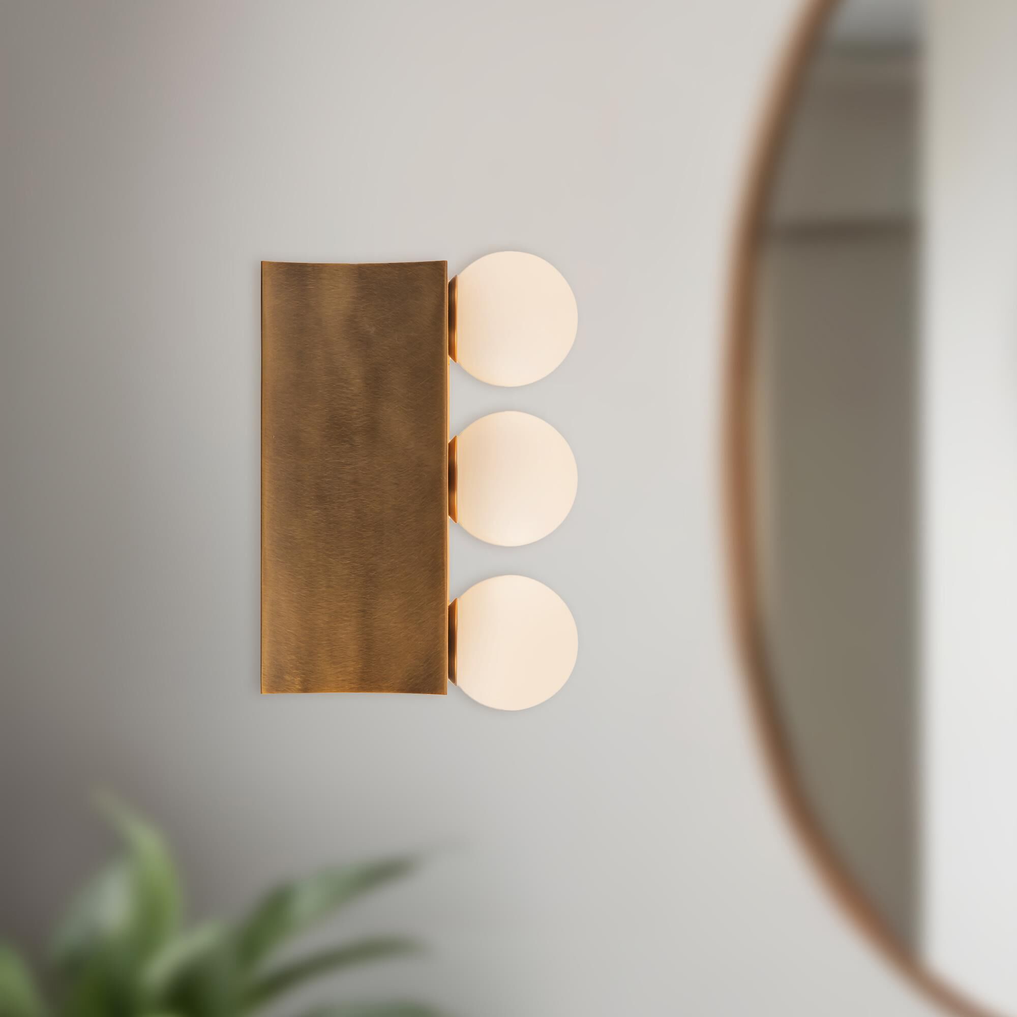 Shown in Vintage Brass finish and Opal glass