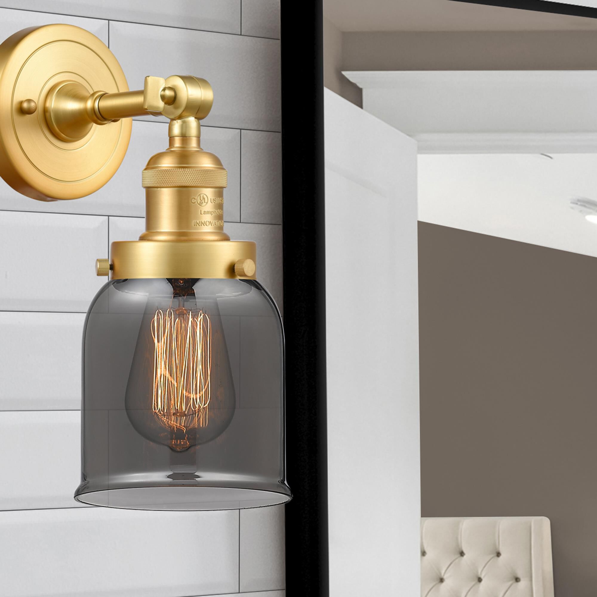 Shown in Satin Gold finish and Plated Smoke Small Bell glass