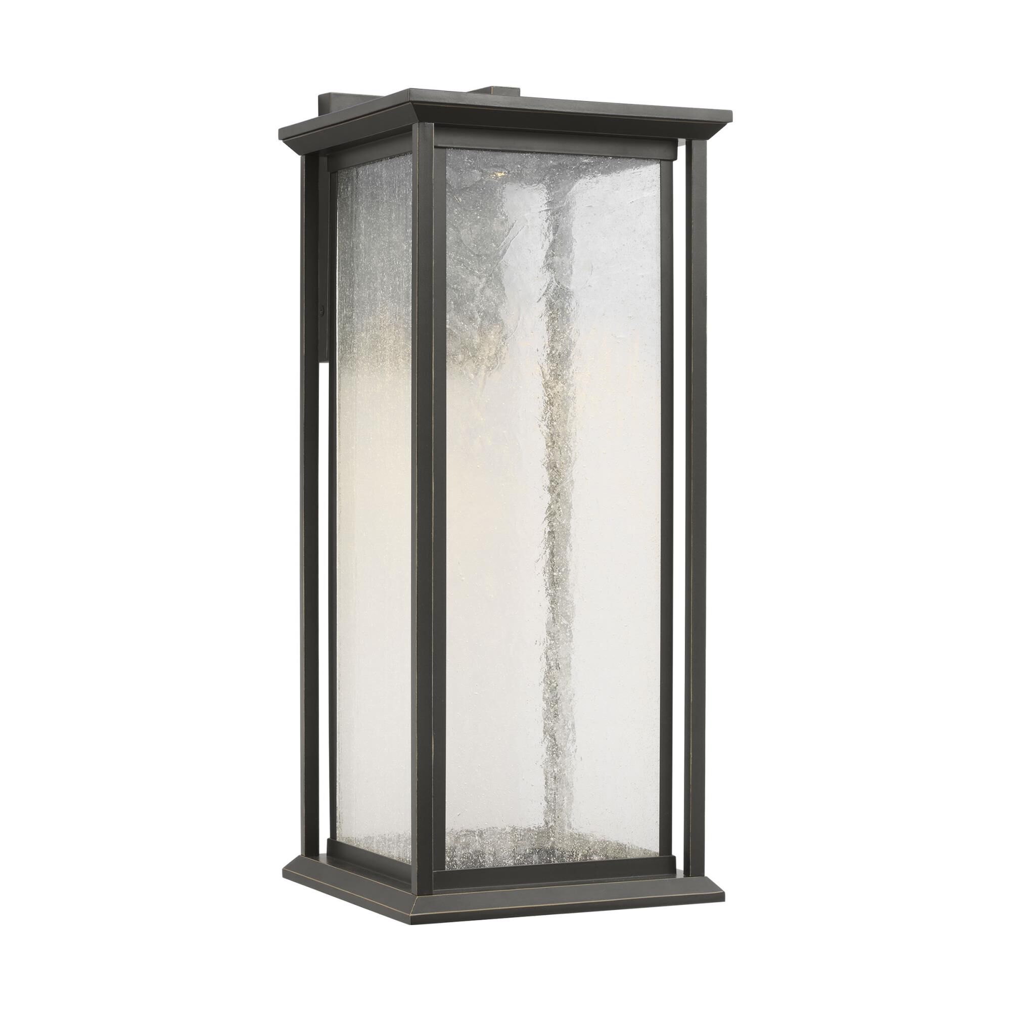 Shown in Antique Bronze finish and Distressed Seeded Glass Panels shade
