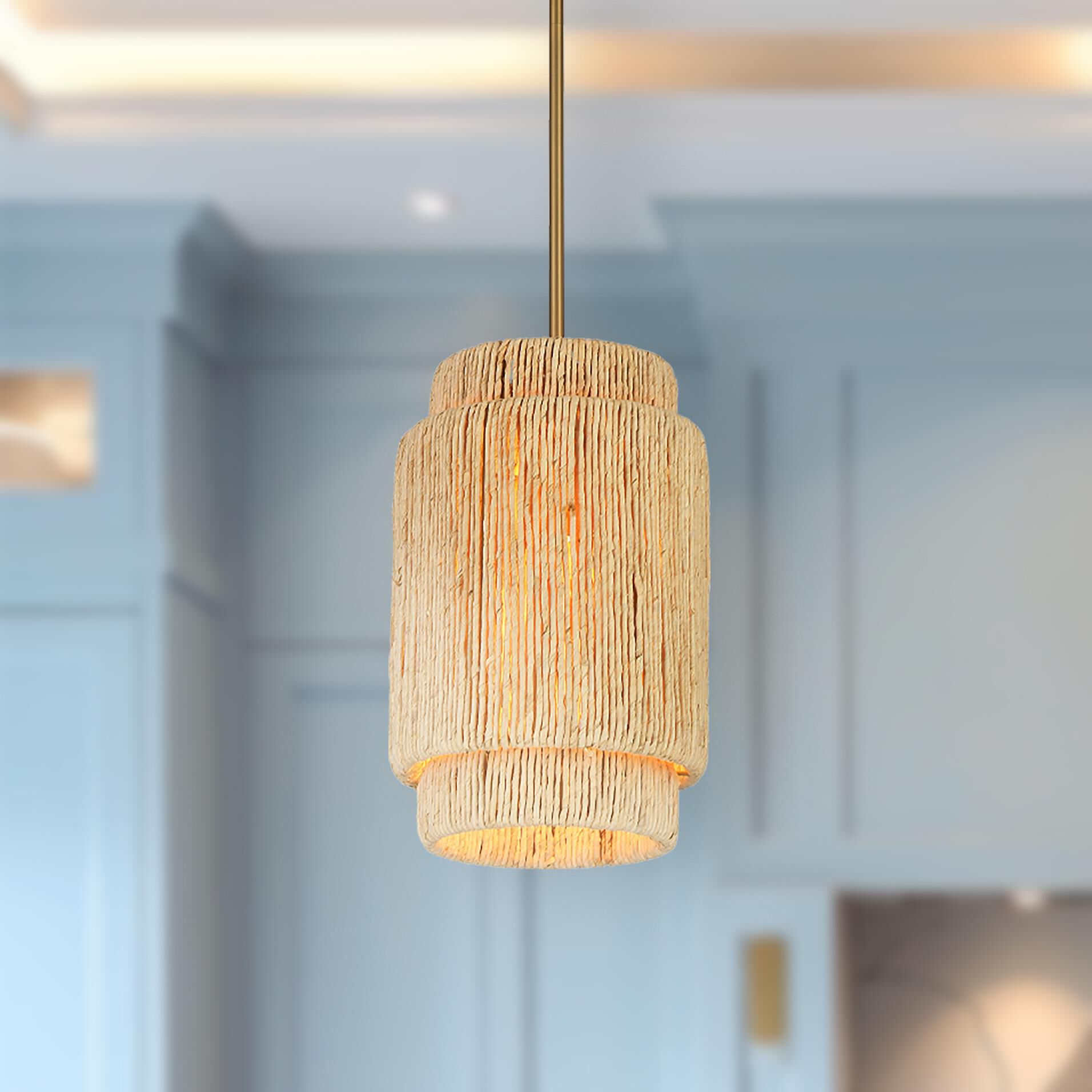 Shown in Signature Brass finish and Natural Abaca shade