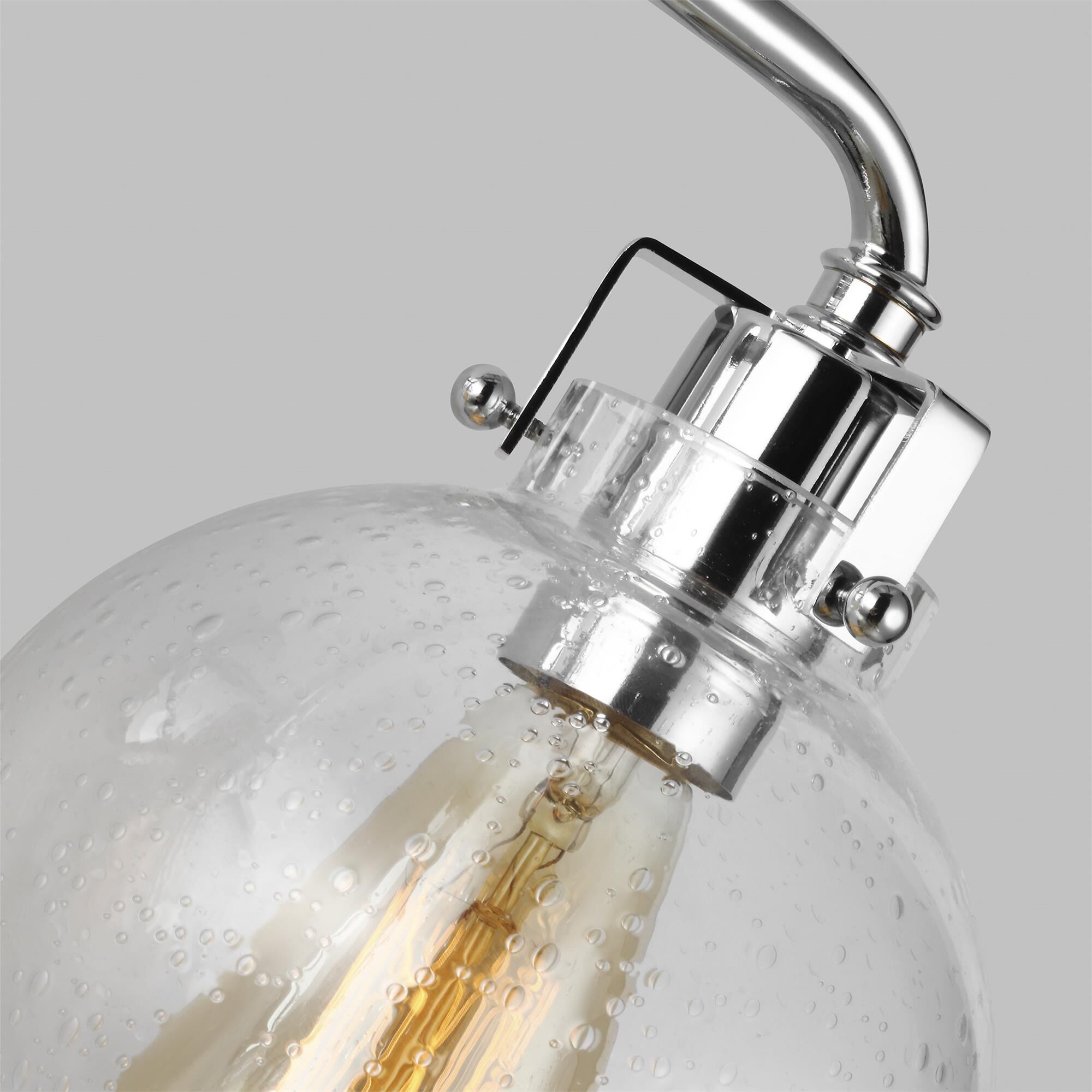 Shown in Chrome finish and Clear Seeded glass